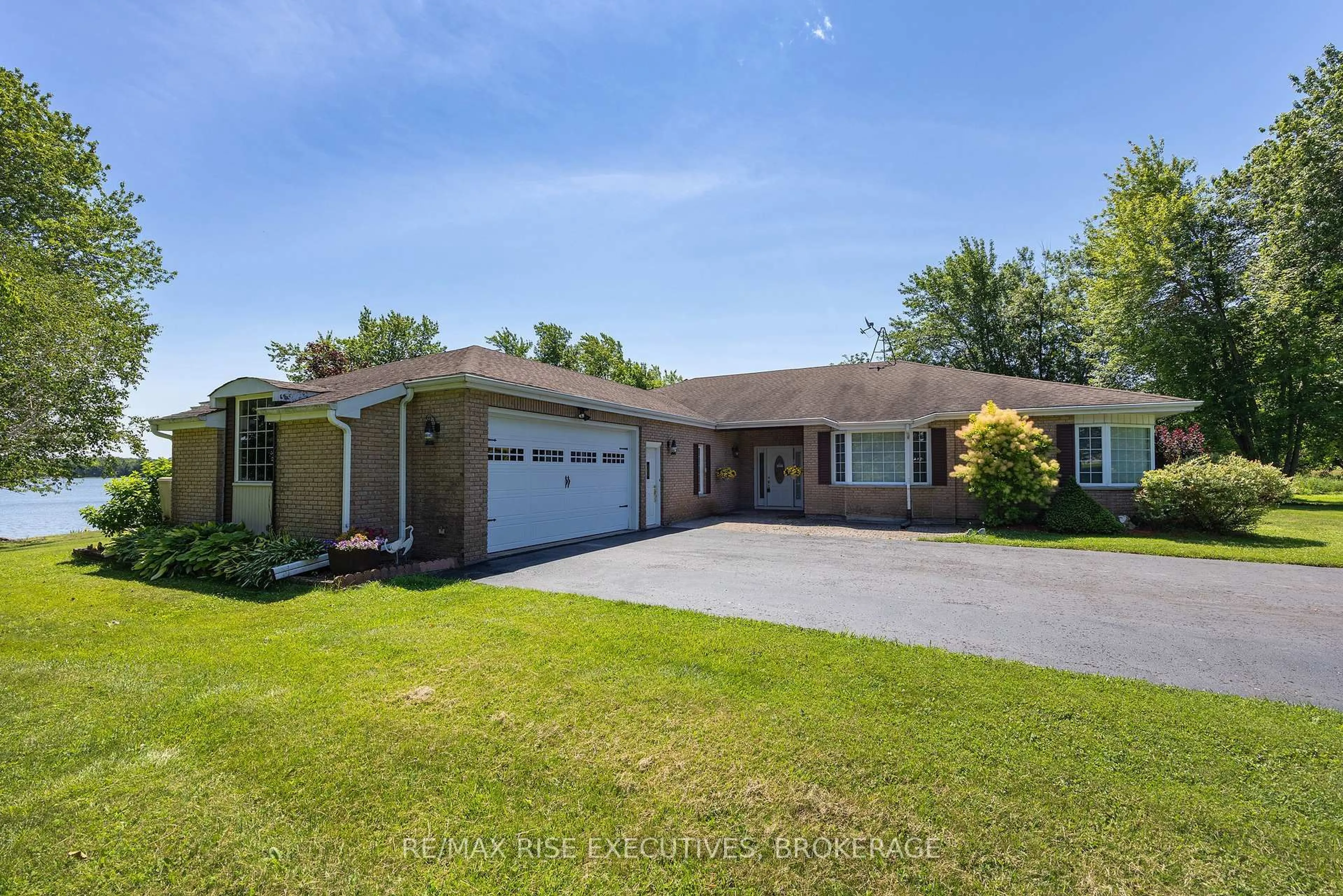 A pic from outside/outdoor area/front of a property/back of a property/a pic from drone, street for 5054 Lower Round Lake Rd, Battersea Ontario K0H 1H0