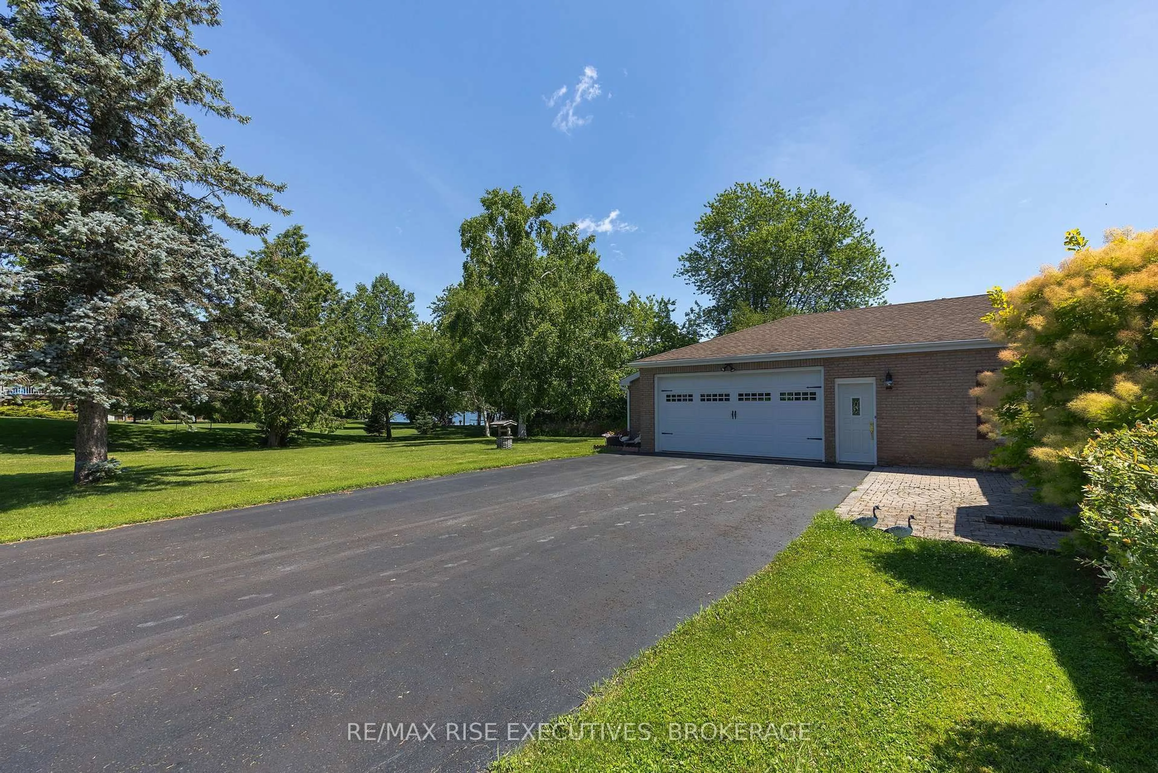 A pic from outside/outdoor area/front of a property/back of a property/a pic from drone, water/lake/river/ocean view for 5054 Lower Round Lake Rd, Battersea Ontario K0H 1H0