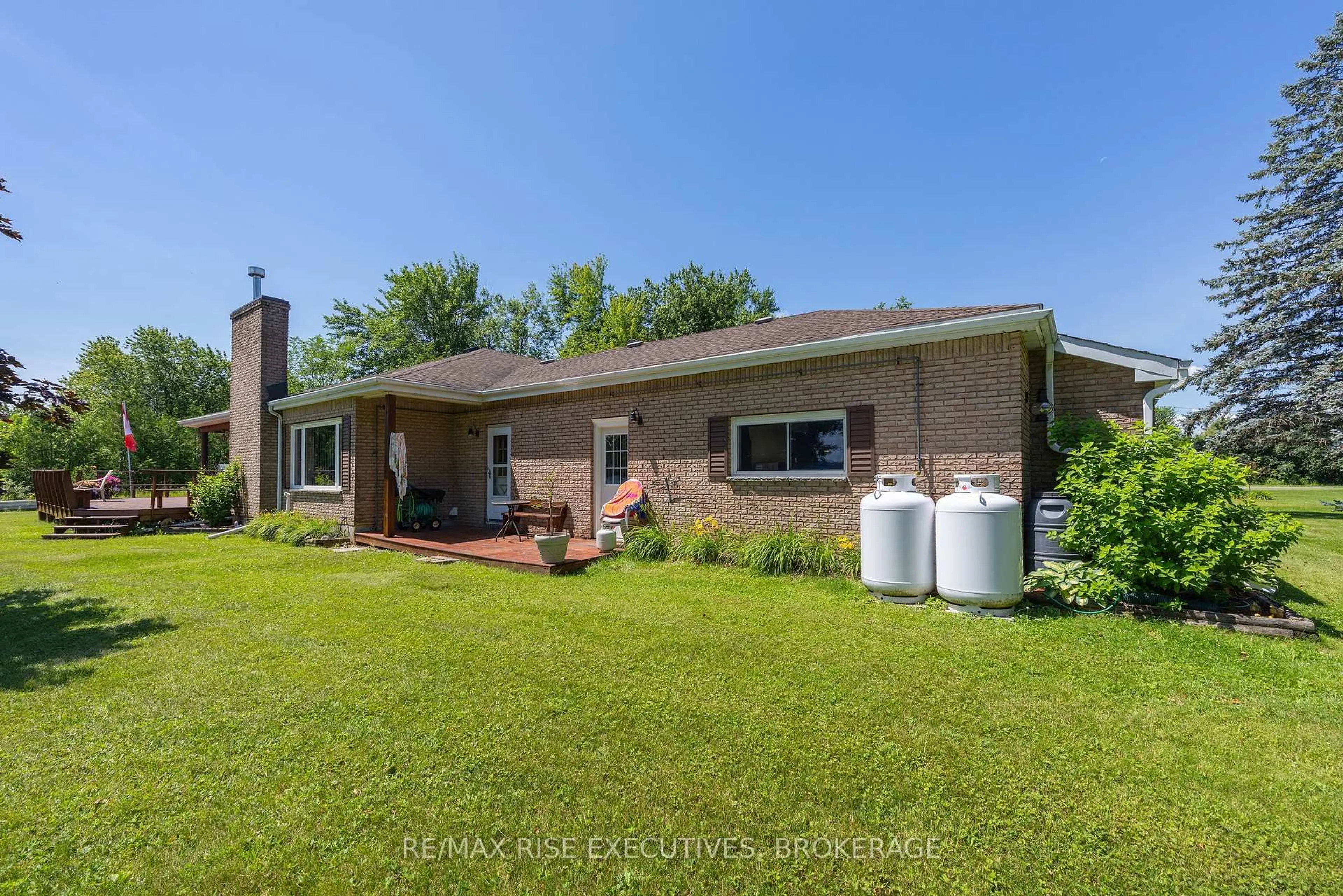 A pic from outside/outdoor area/front of a property/back of a property/a pic from drone, water/lake/river/ocean view for 5054 Lower Round Lake Rd, Battersea Ontario K0H 1H0
