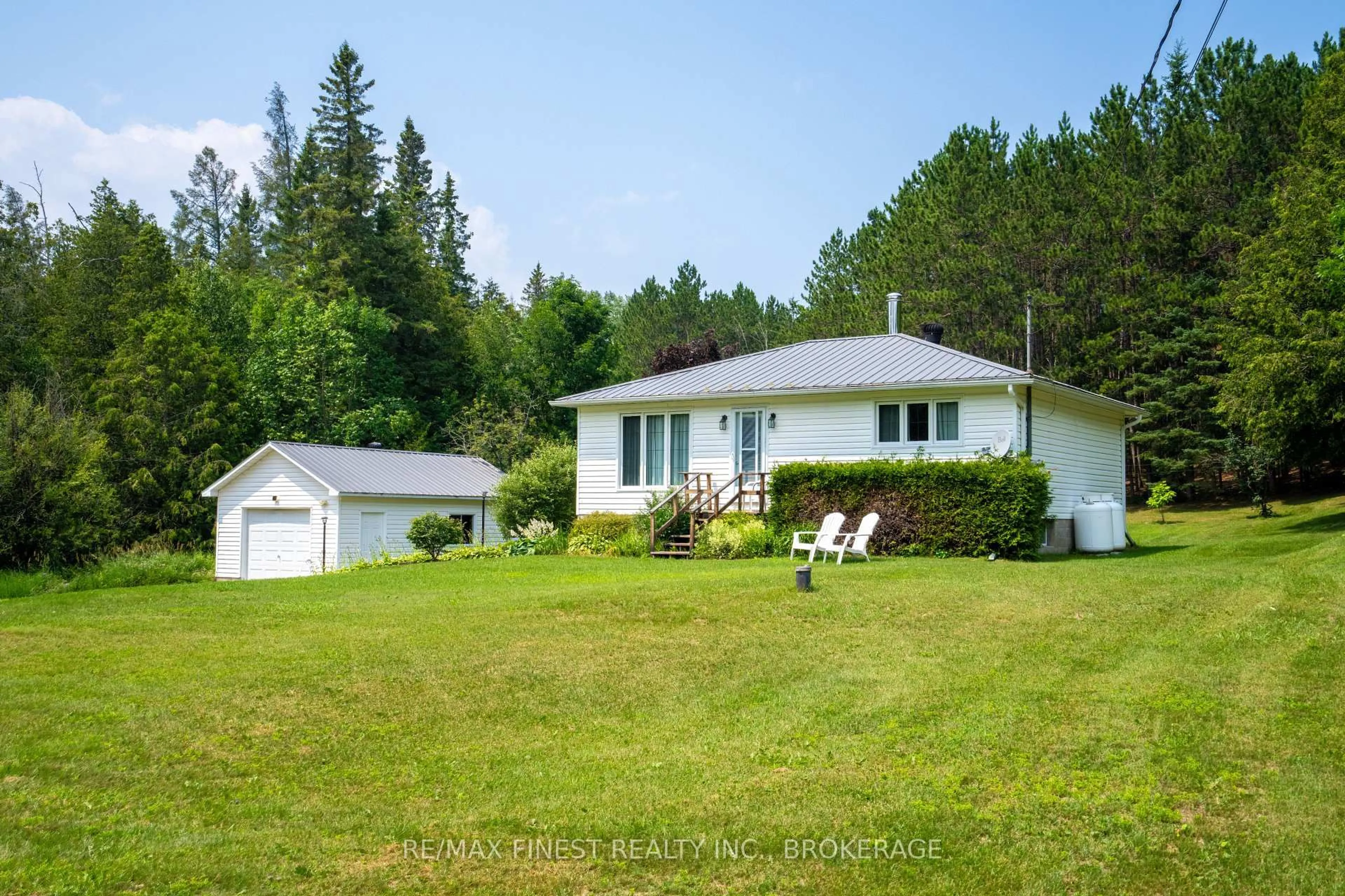 A pic from outside/outdoor area/front of a property/back of a property/a pic from drone, water/lake/river/ocean view for 1031 James Rd, Plevna Ontario K0H 2M0