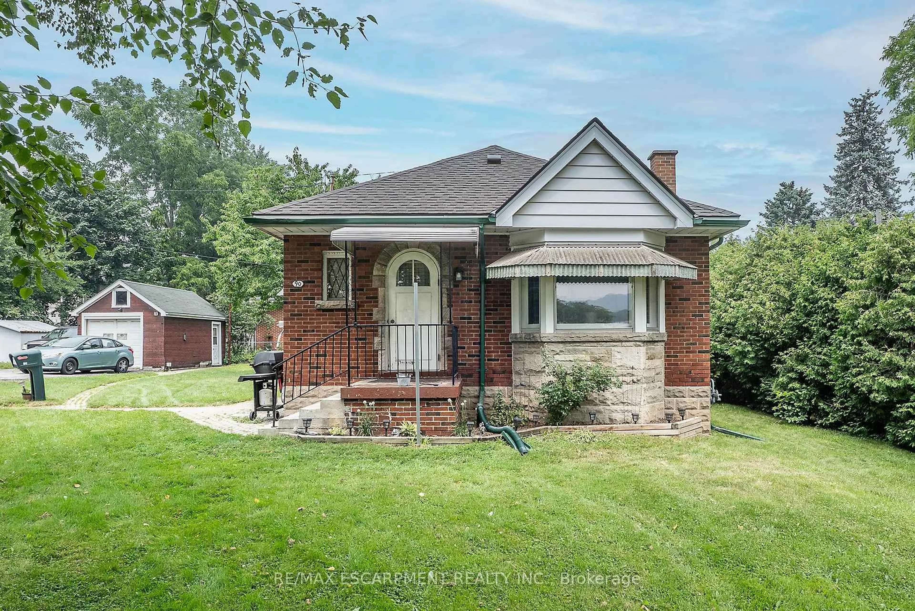 Home with brick exterior material, street for 90 Osler Dr, Hamilton Ontario L9H 4B5