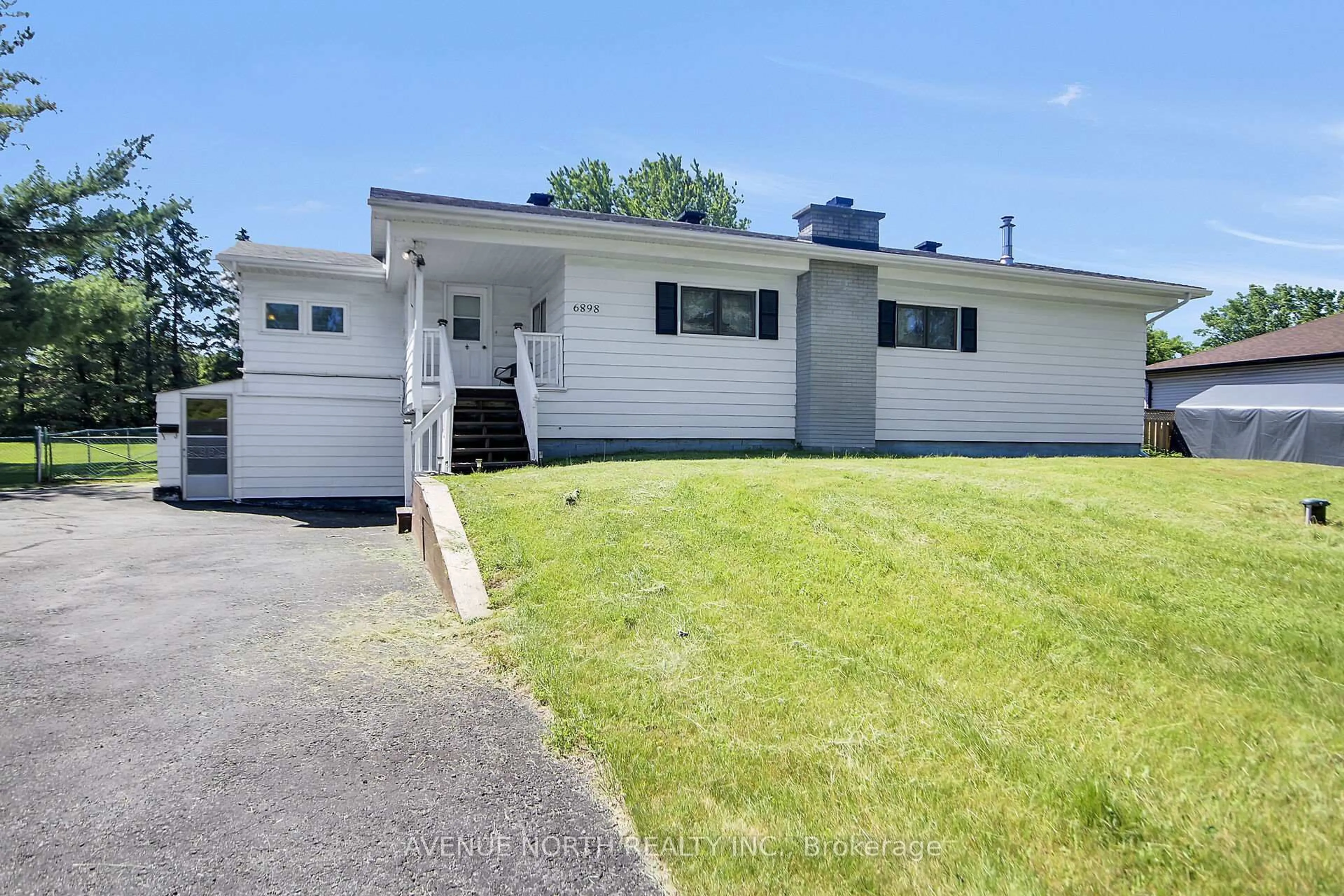 Home with vinyl exterior material, street for 6898 Mitch Owens Rd, Greely Ontario K4P 1C5