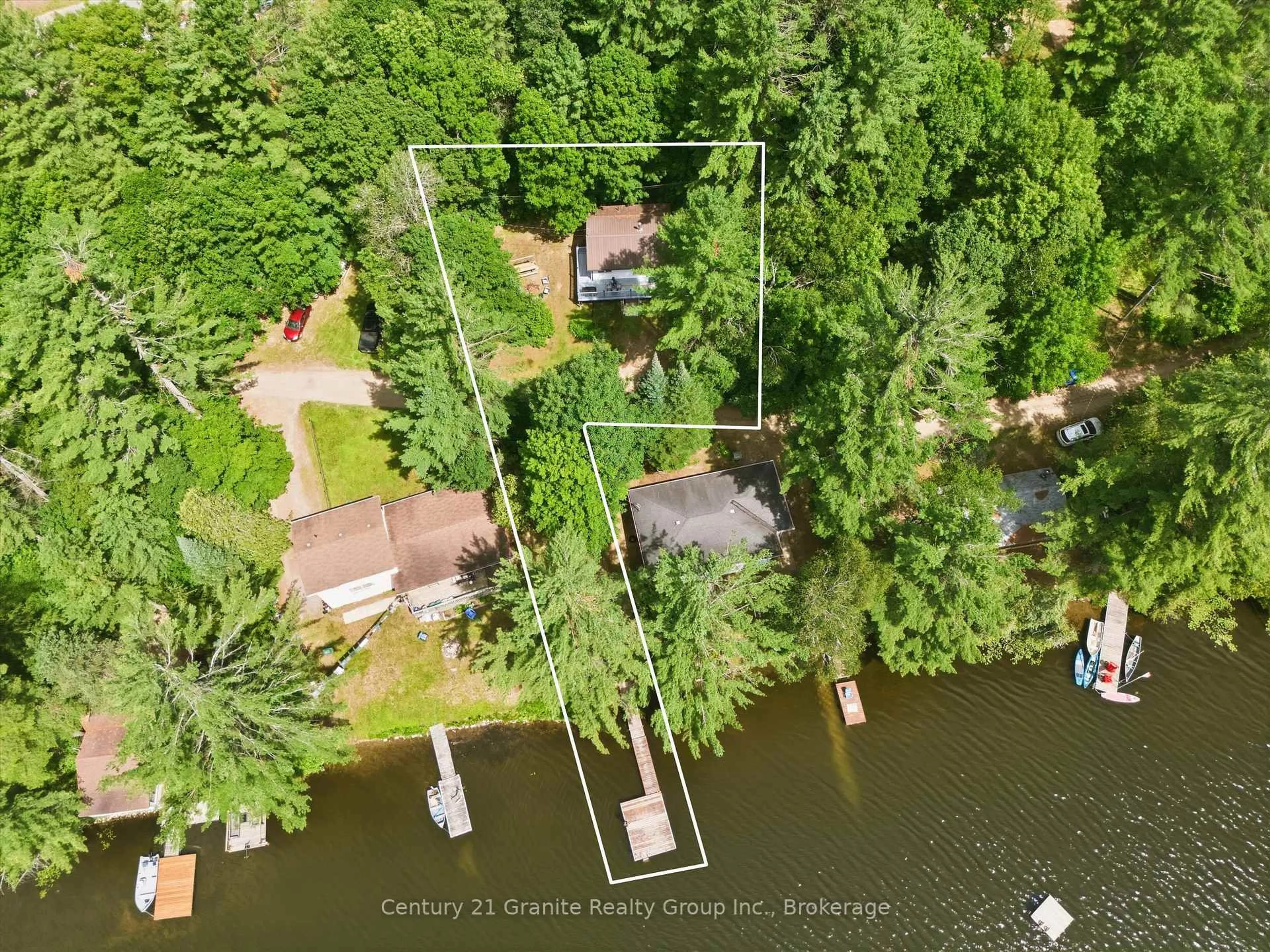 A pic from outside/outdoor area/front of a property/back of a property/a pic from drone, water/lake/river/ocean view for 1019 Pike Lane, Dysart et al Ontario K0M 1S0