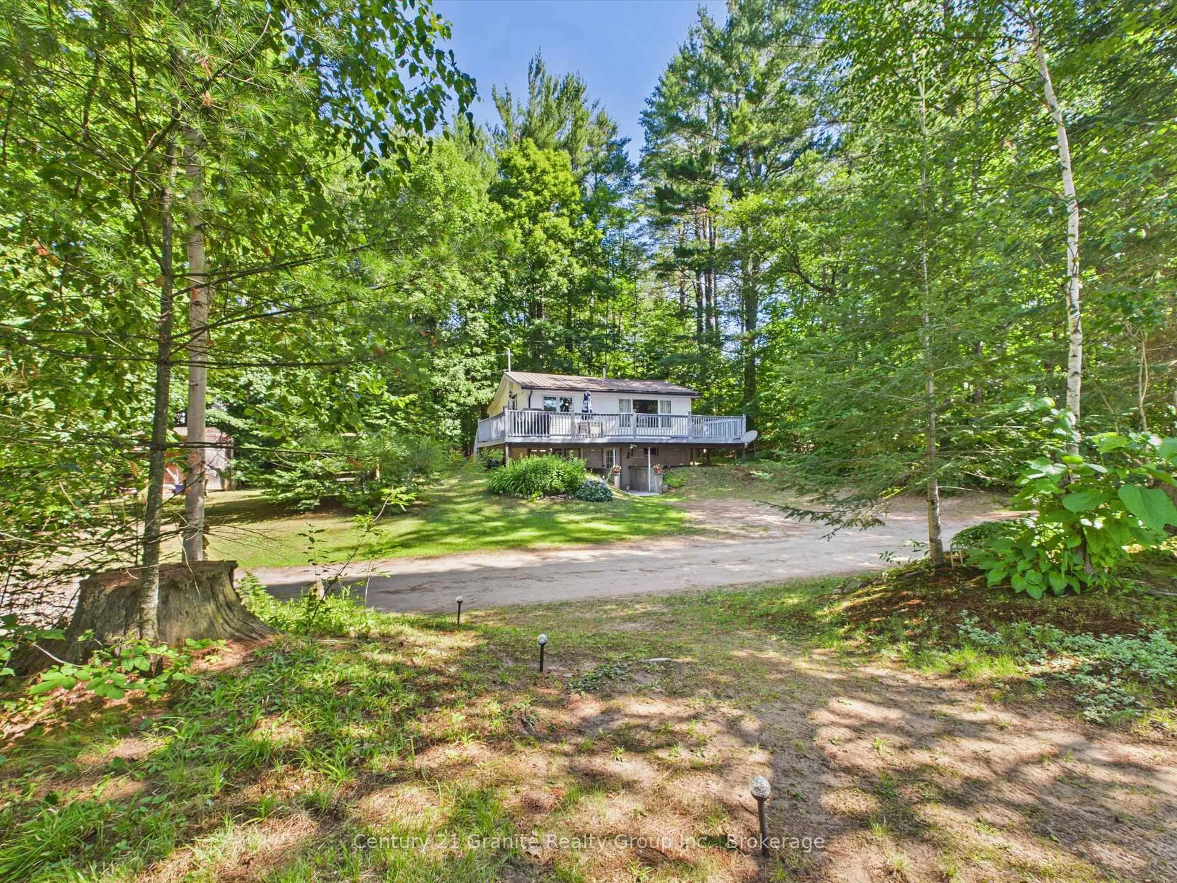 A pic from outside/outdoor area/front of a property/back of a property/a pic from drone, forest/trees view for 1019 Pike Lane, Dysart et al Ontario K0M 1S0
