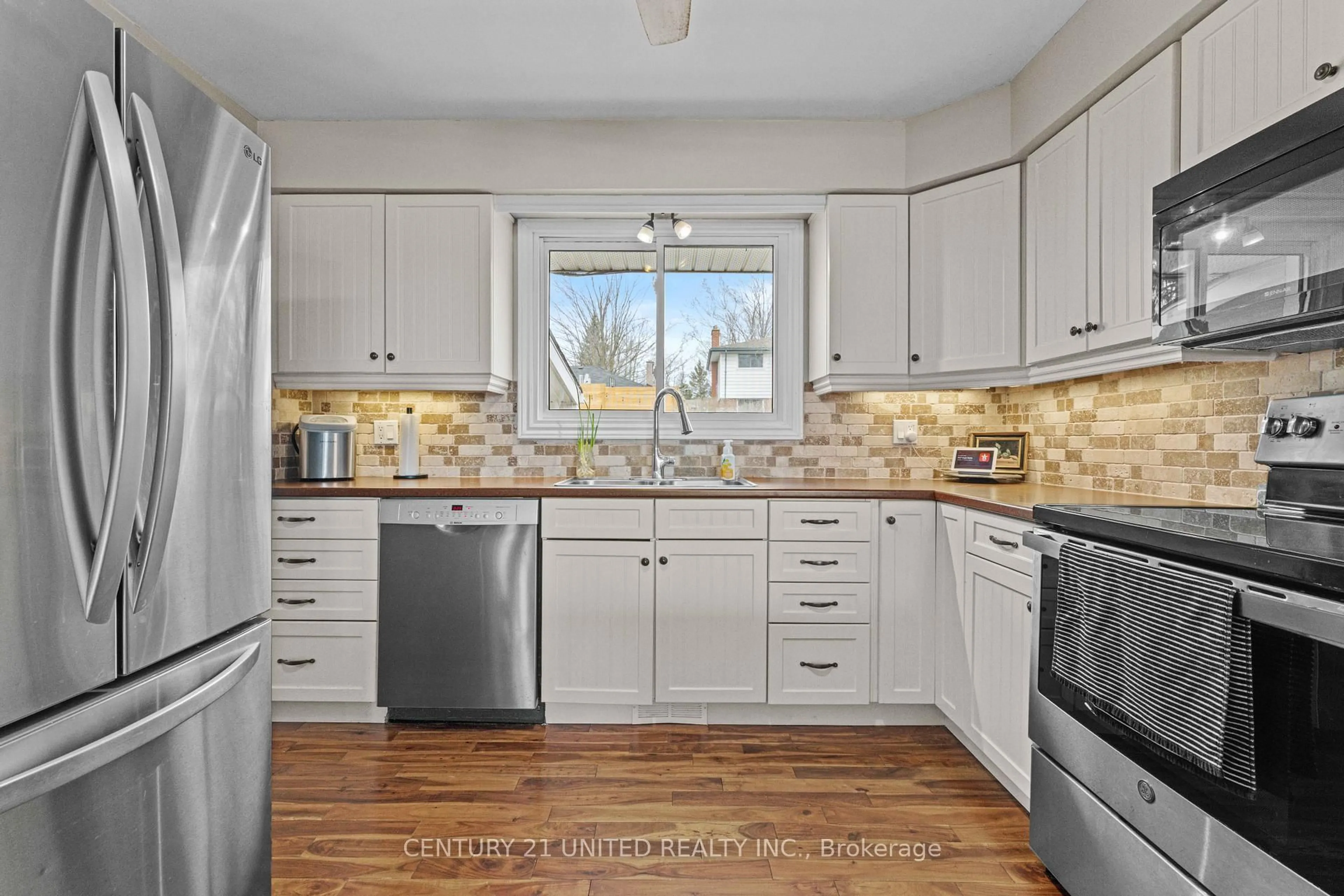 Open concept kitchen, ceramic/tile floor for 1277 Olympus Ave, Peterborough Ontario K9H 6V9