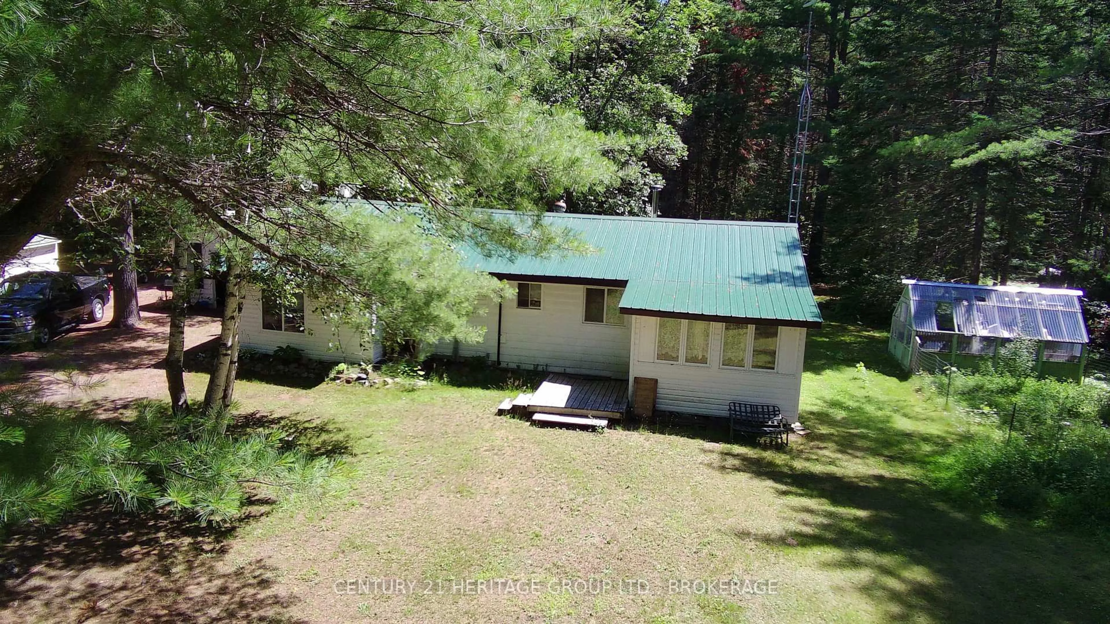 A pic from outside/outdoor area/front of a property/back of a property/a pic from drone, forest/trees view for 19473 41 Highway, Cloyne Ontario K0H 1K0