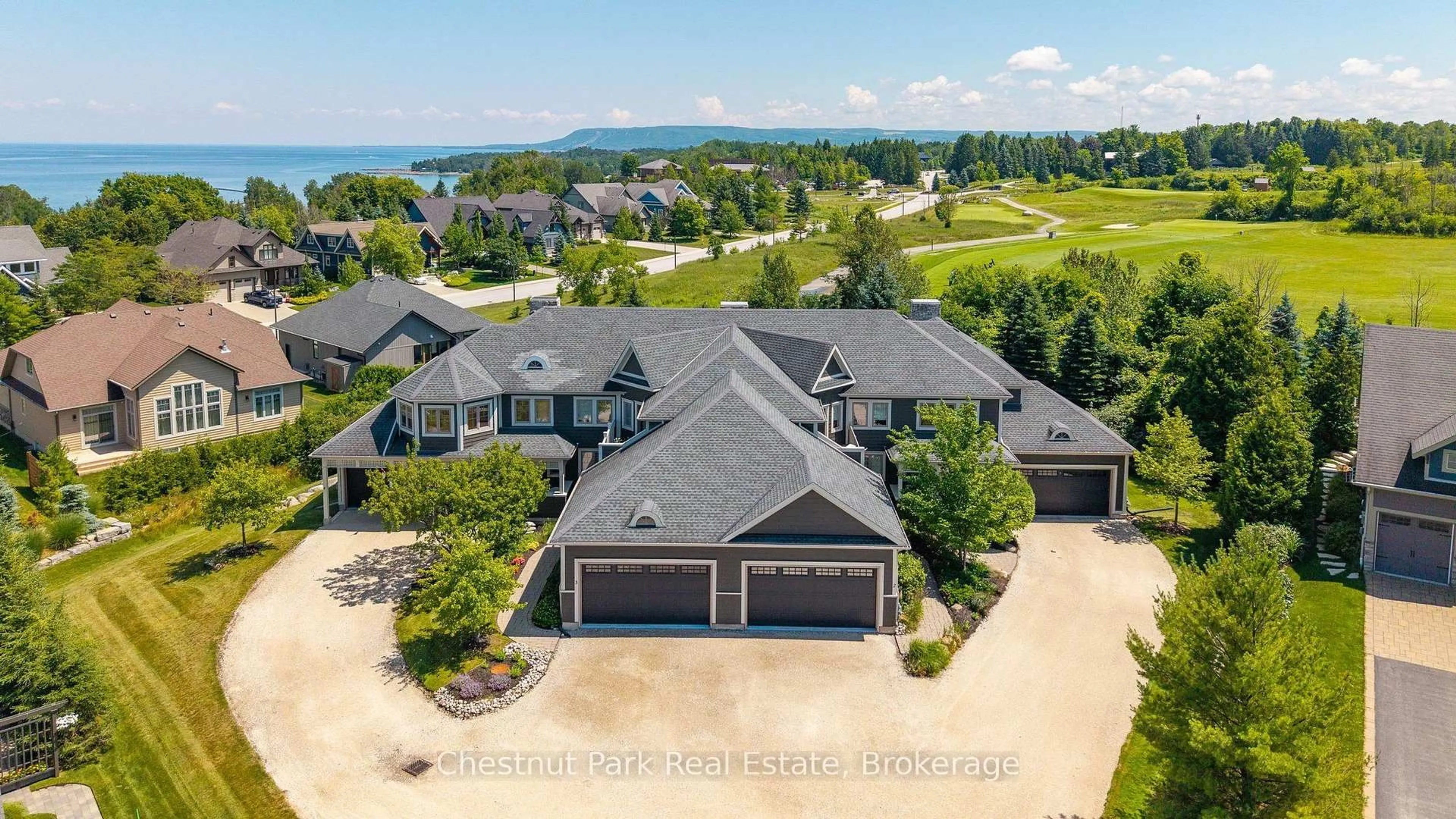 A pic from outside/outdoor area/front of a property/back of a property/a pic from drone, water/lake/river/ocean view for 108 Landry Lane #3, Blue Mountains Ontario N0H 2P0
