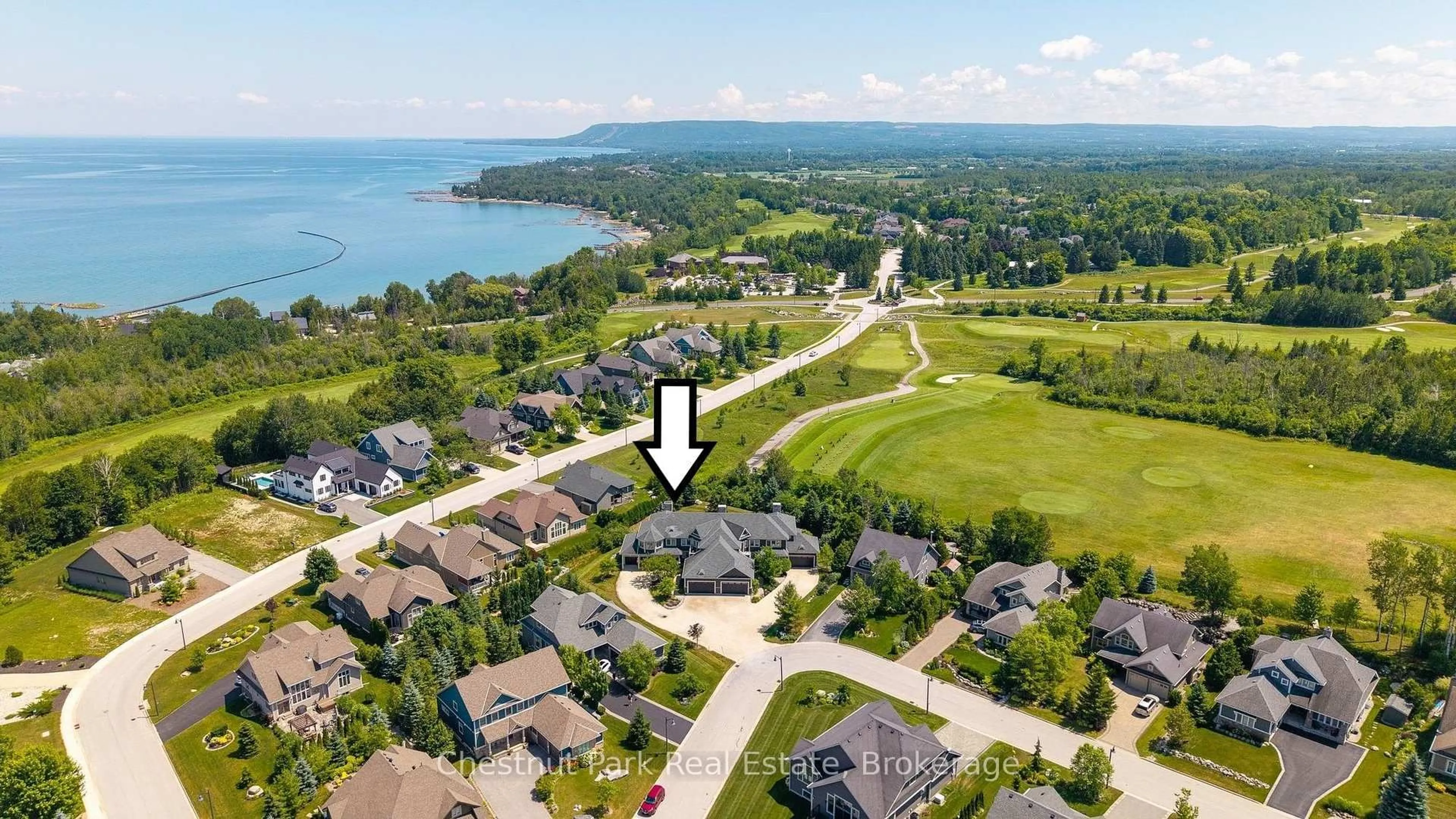 A pic from outside/outdoor area/front of a property/back of a property/a pic from drone, water/lake/river/ocean view for 108 Landry Lane #3, Blue Mountains Ontario N0H 2P0