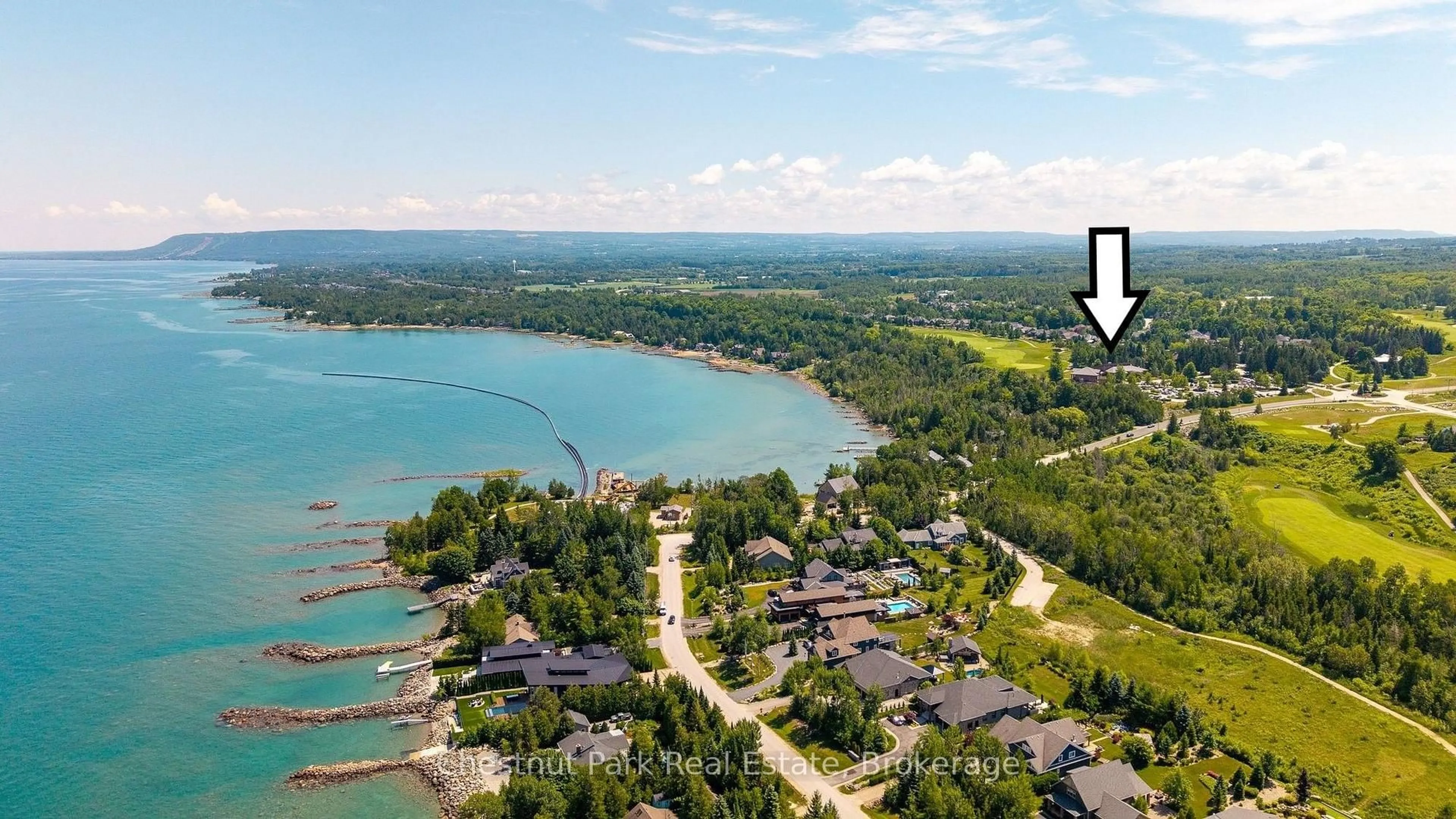 A pic from outside/outdoor area/front of a property/back of a property/a pic from drone, water/lake/river/ocean view for 108 Landry Lane #3, Blue Mountains Ontario N0H 2P0