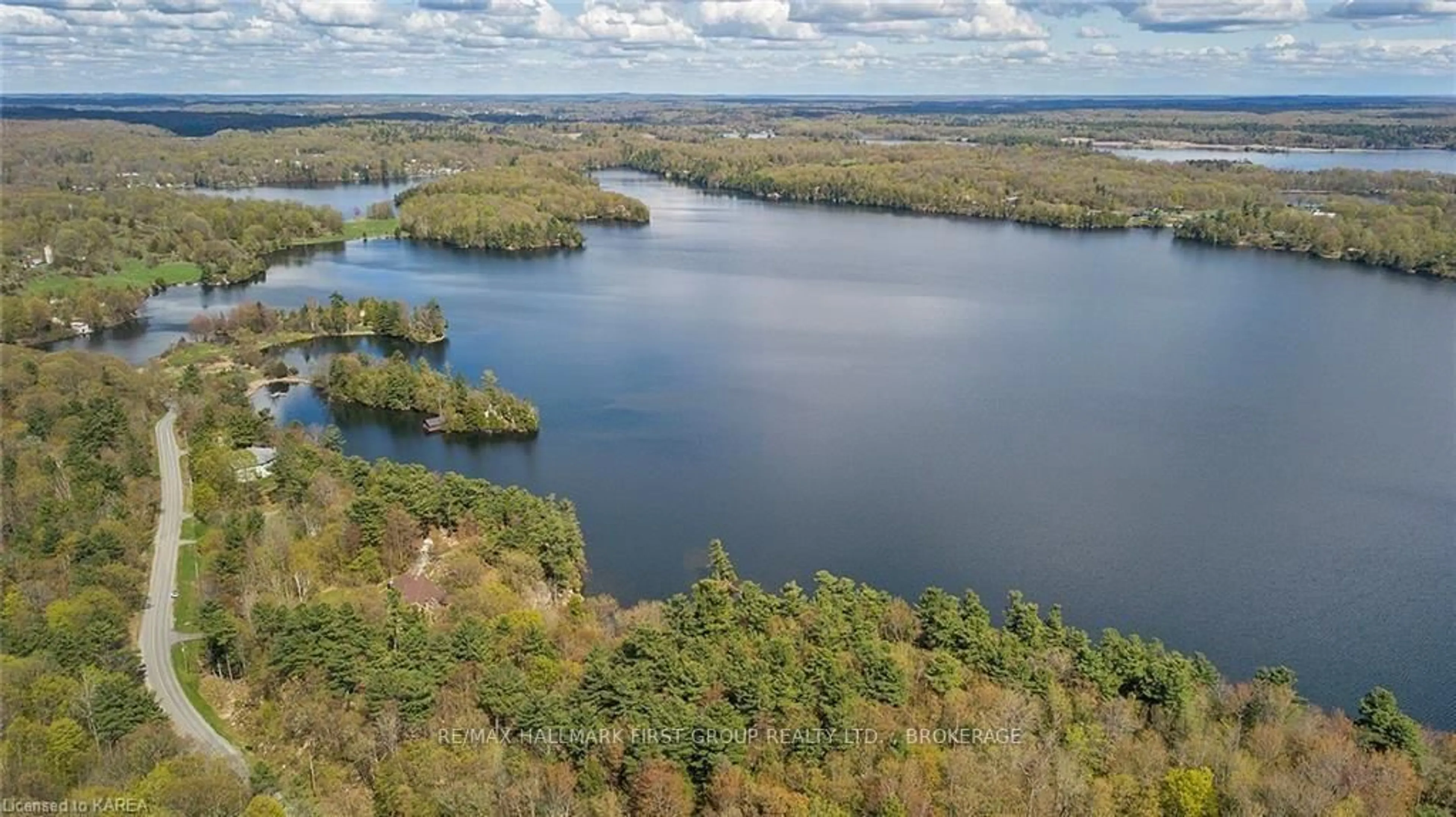A pic from outside/outdoor area/front of a property/back of a property/a pic from drone, water/lake/river/ocean view for 1525 BURNT HILLS Rd, Battersea Ontario K0H 1H0