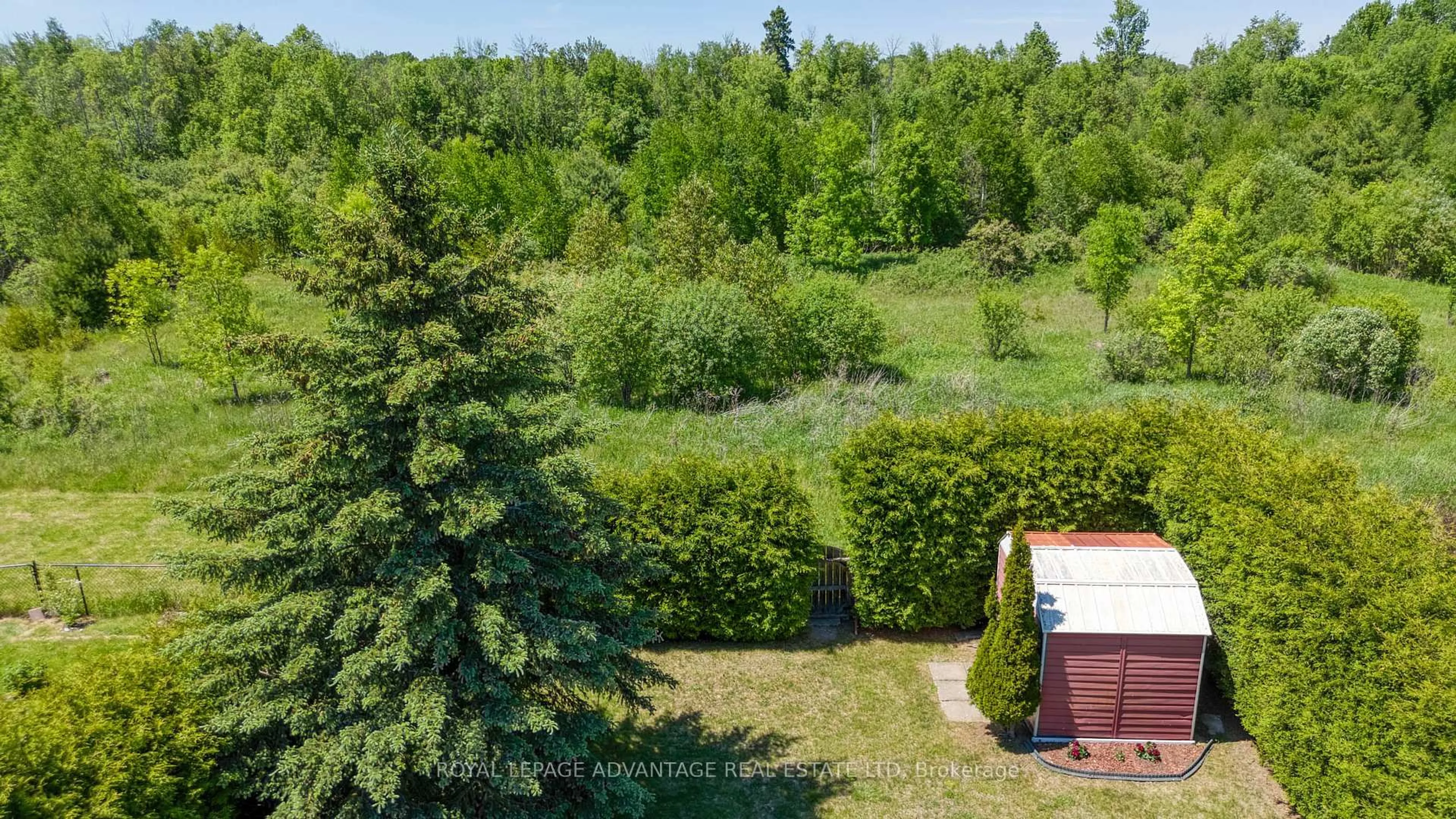 A pic from outside/outdoor area/front of a property/back of a property/a pic from drone, forest/trees view for 15 Antonio Way, Perth Ontario K7H 3R5