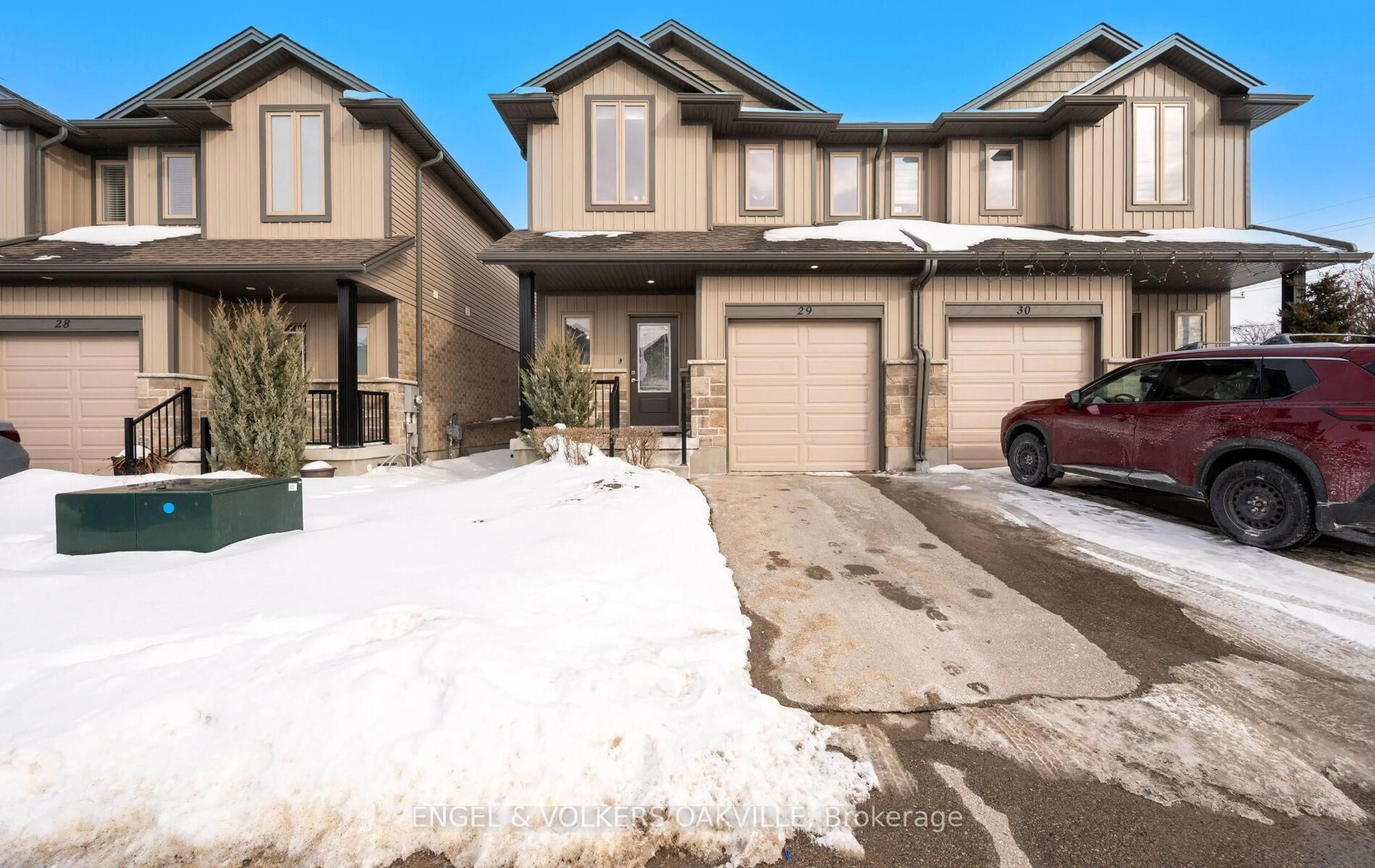 A pic from outside/outdoor area/front of a property/back of a property/a pic from drone, street for 1023 Devonshire Ave #29, Woodstock Ontario N4S 5S1