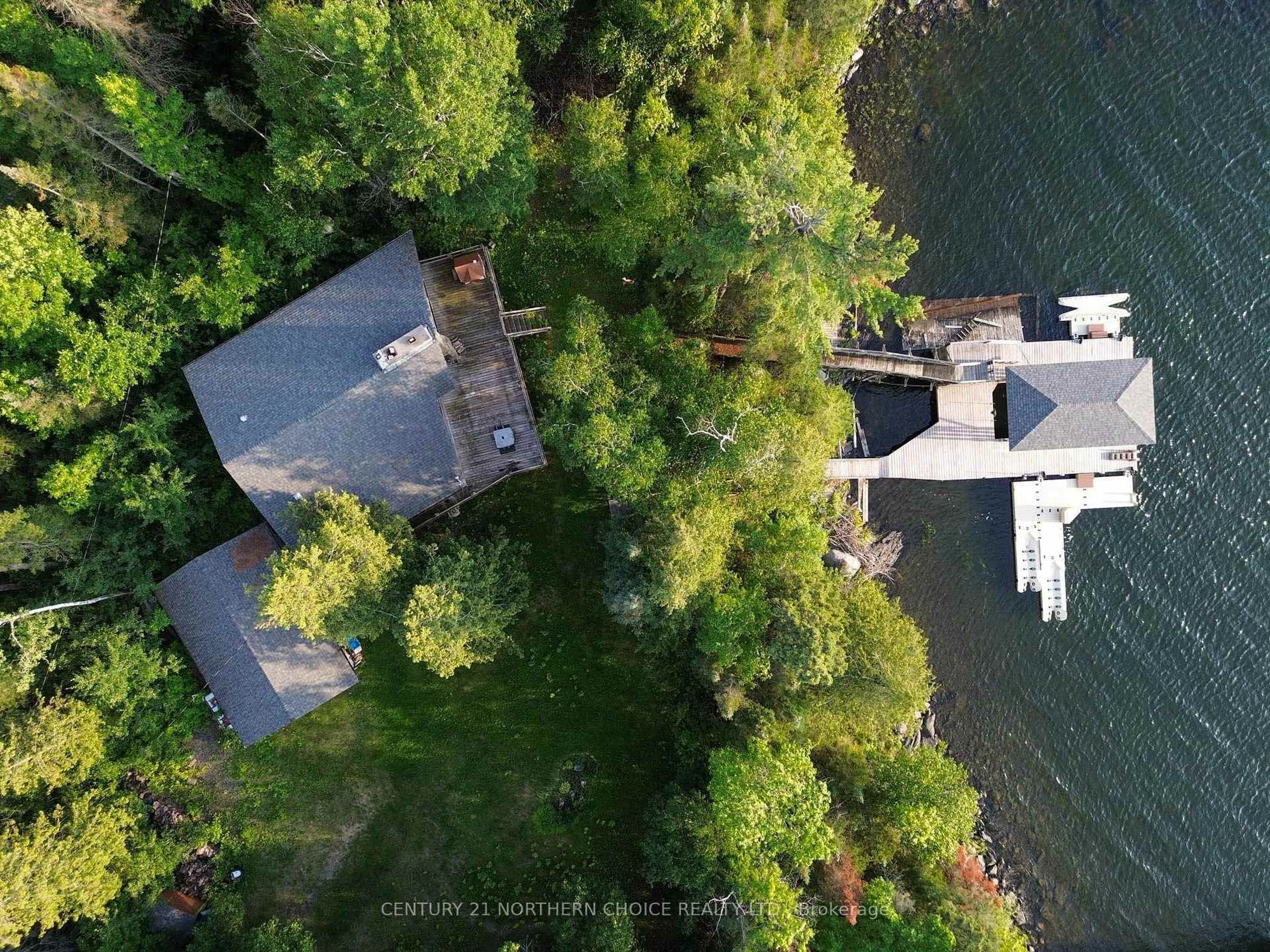 A pic from outside/outdoor area/front of a property/back of a property/a pic from drone, water/lake/river/ocean view for 75 Black Bear Rd, Kenora Remote Area Ontario P0X 1E0