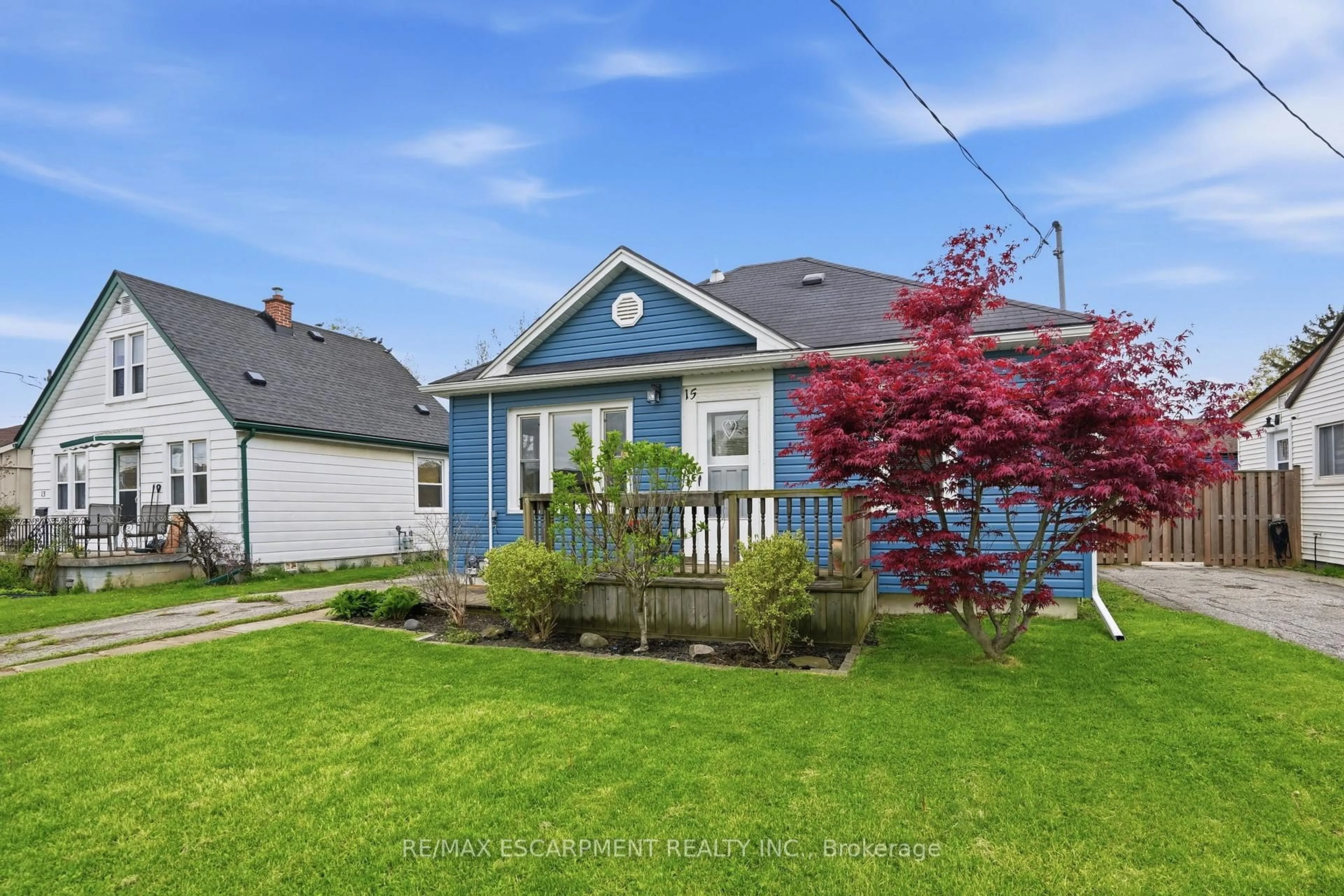 Home with vinyl exterior material, street for 15 Kirk St, St. Catharines Ontario L2S 1B8