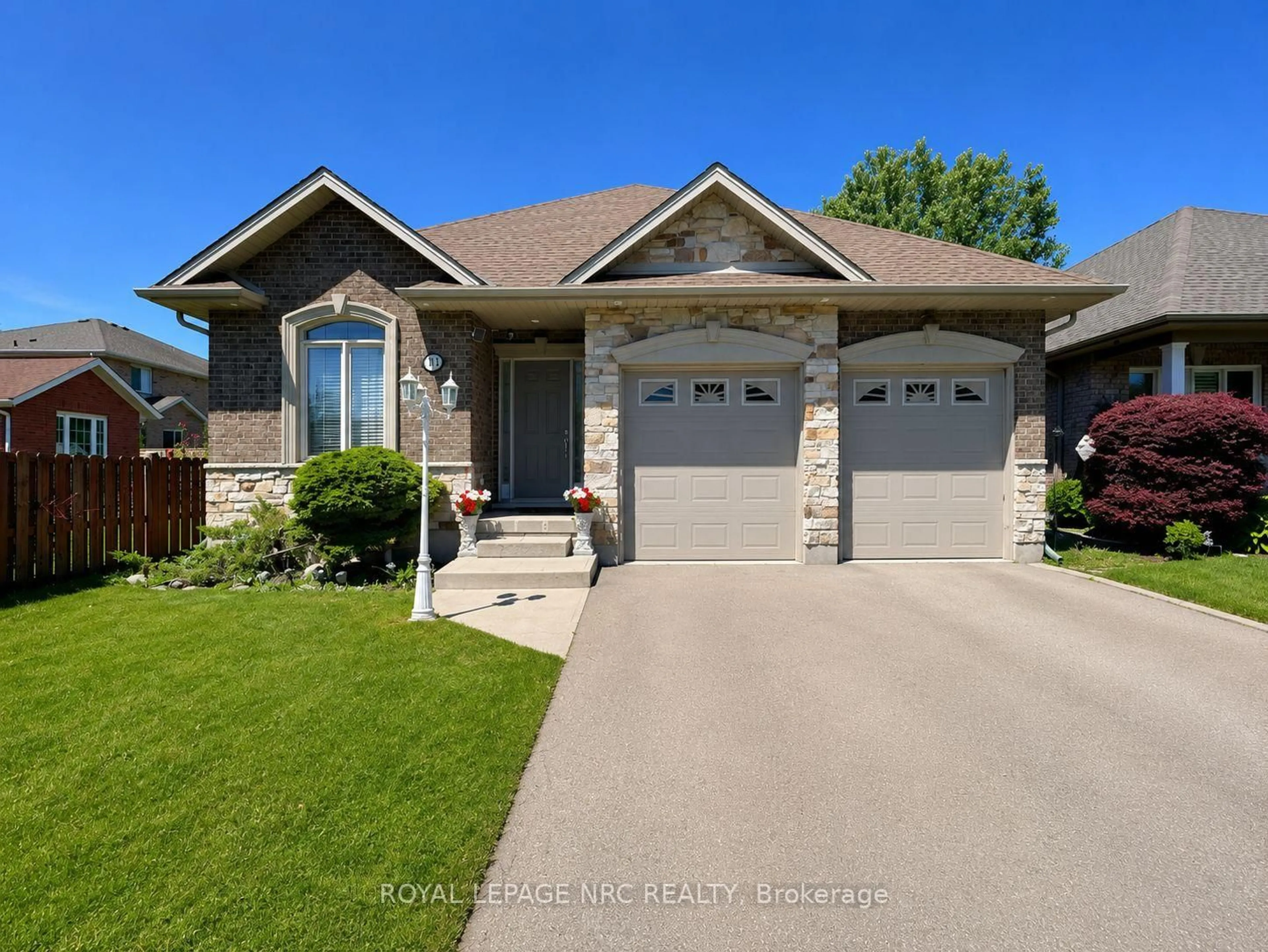 Home with brick exterior material, street for 211 First Street Louth, St. Catharines Ontario L2W 1C2