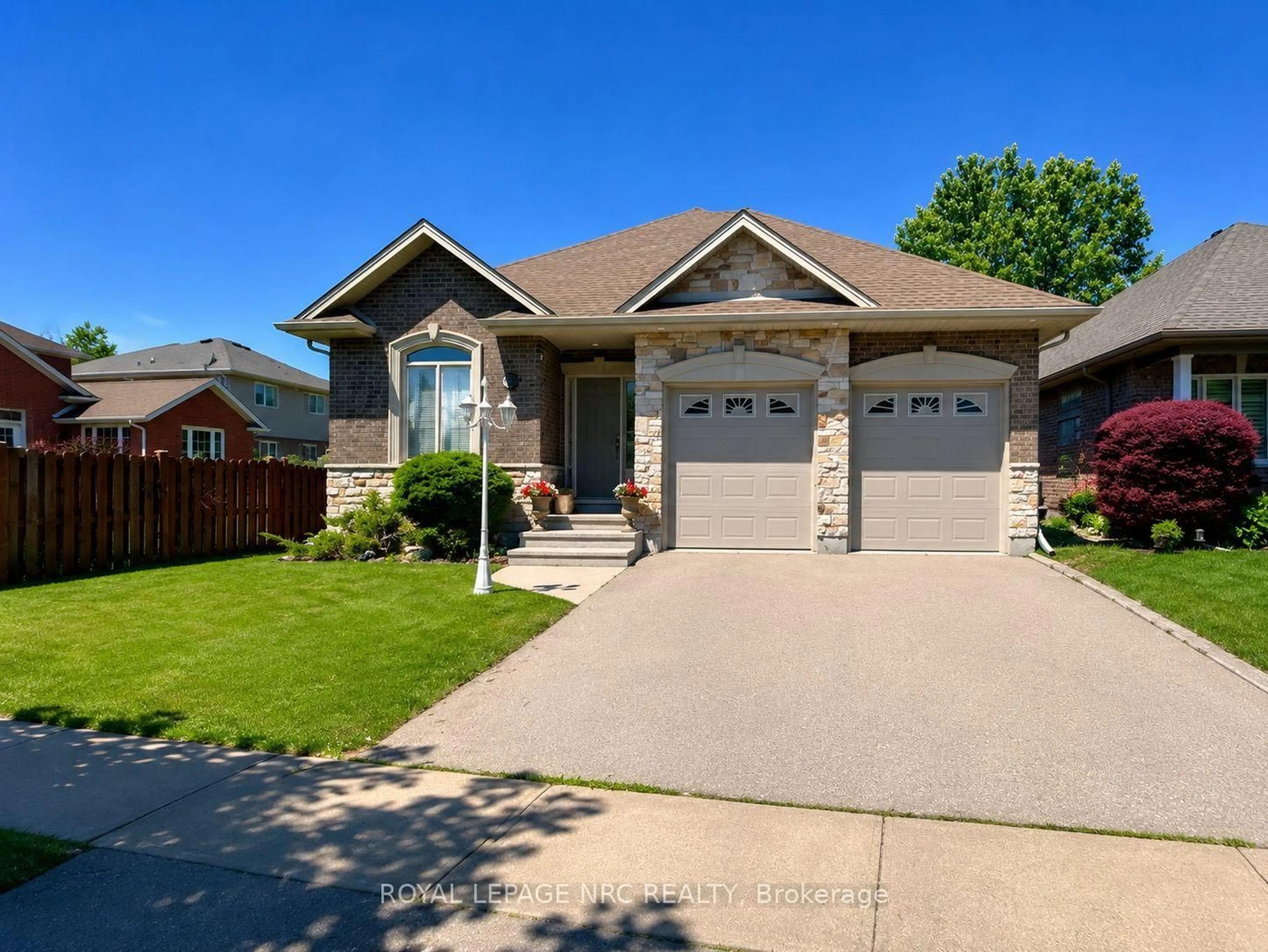 Home with brick exterior material, street for 211 First Street Louth, St. Catharines Ontario L2W 1C2