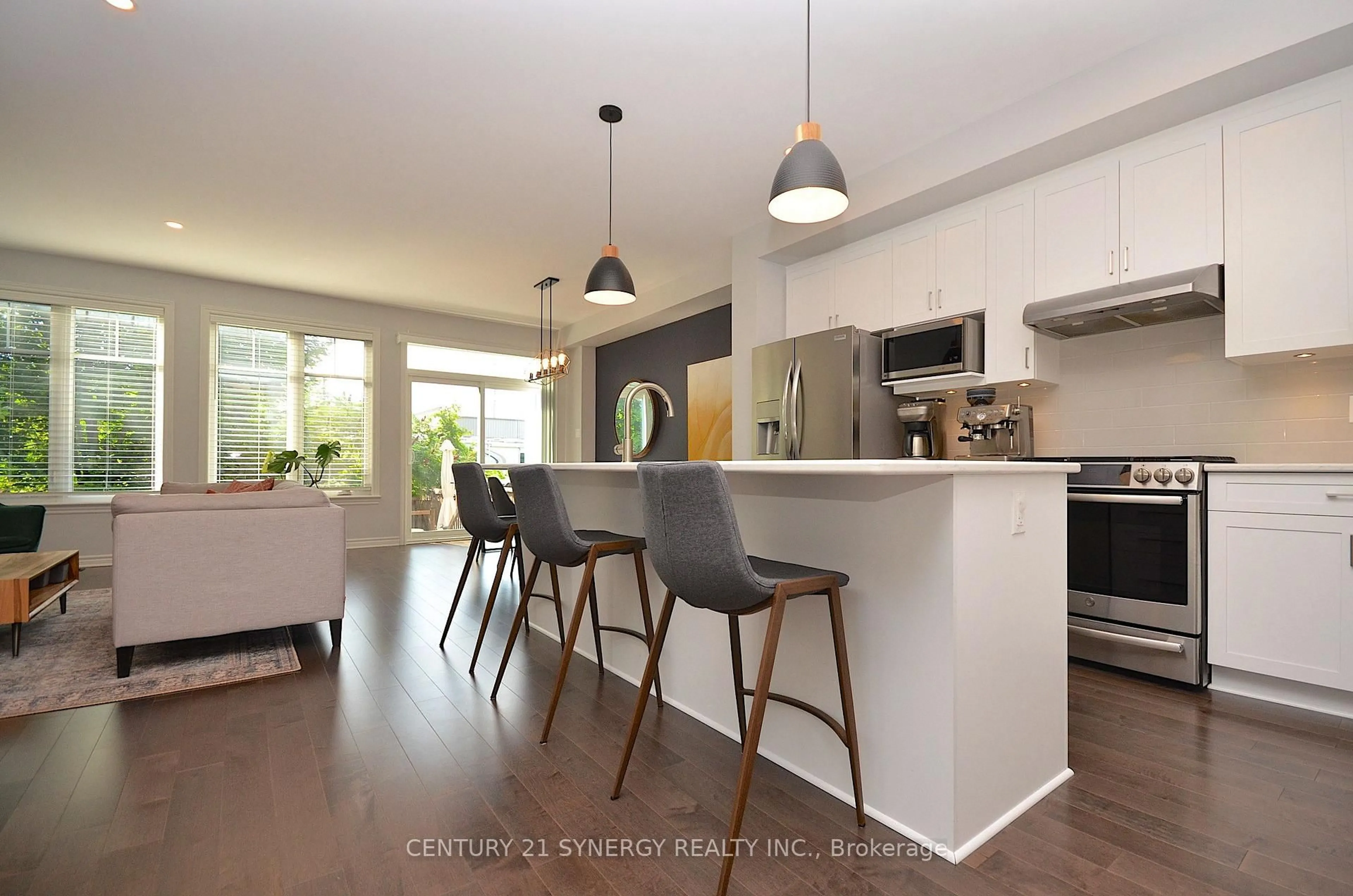 Open concept kitchen, wood/laminate floor for 652 Vivera Pl, Ottawa Ontario K2S 2N1