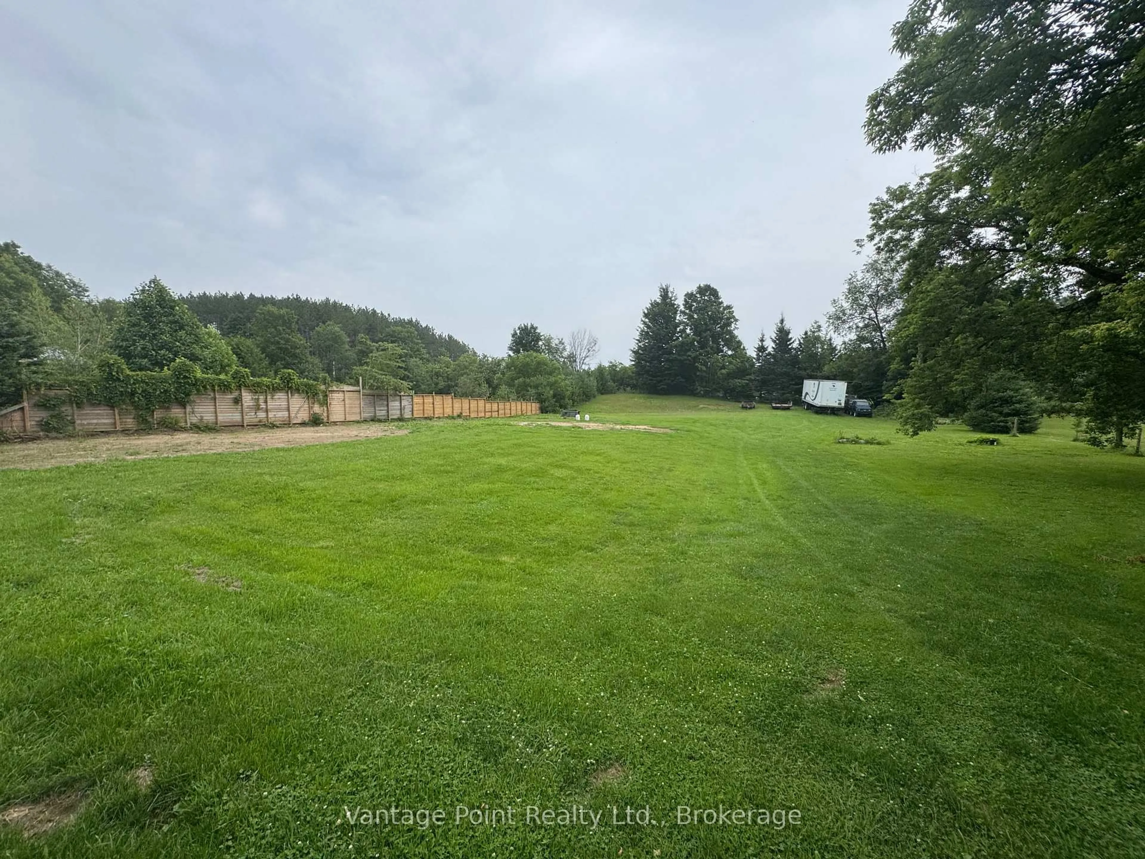 A pic from outside/outdoor area/front of a property/back of a property/a pic from drone, forest/trees view for 136 Torry St, Grey Highlands Ontario N0C 1K0