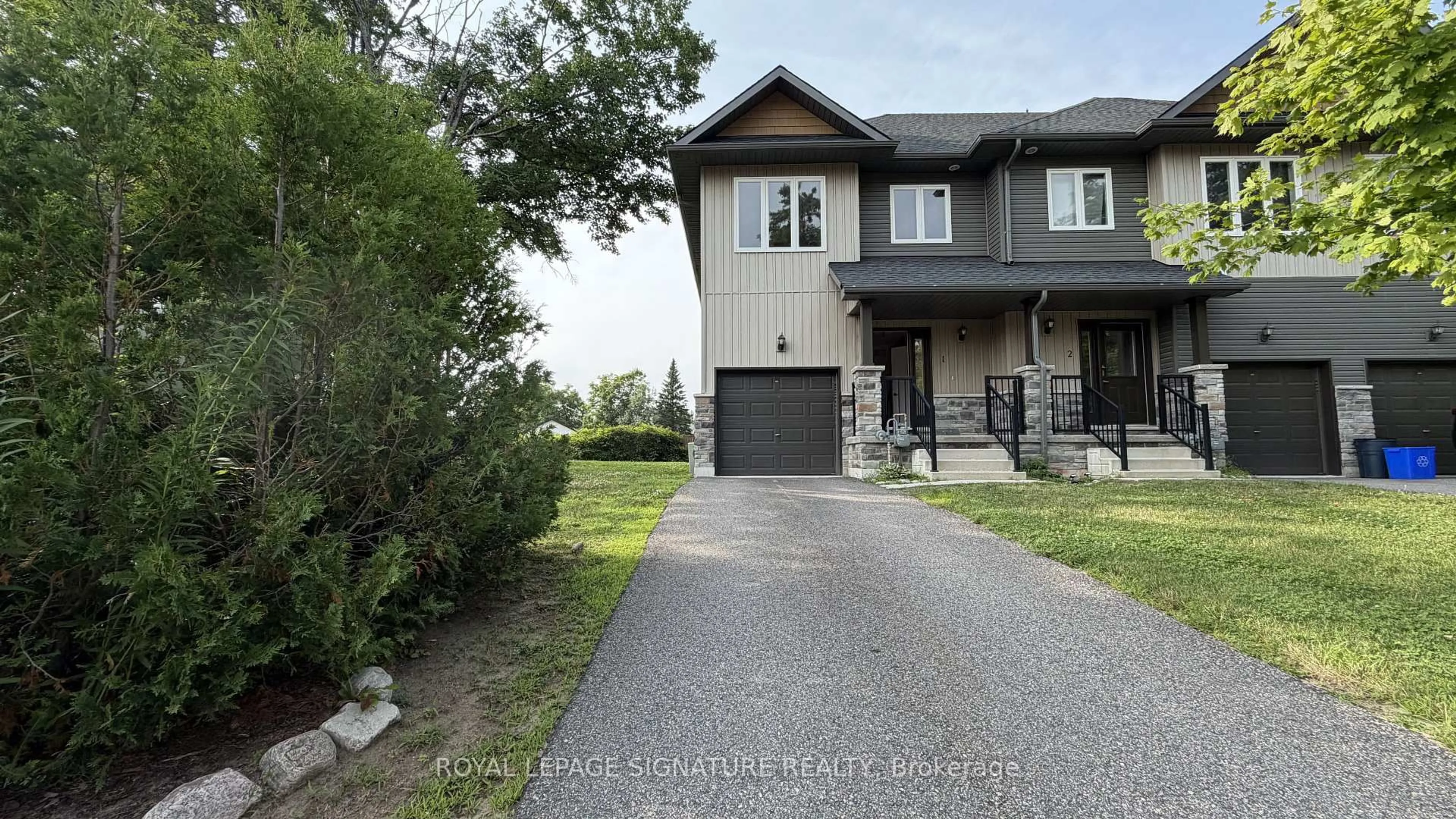 A pic from outside/outdoor area/front of a property/back of a property/a pic from drone, street for 393 Manitoba St #1, Bracebridge Ontario P1L 1B4