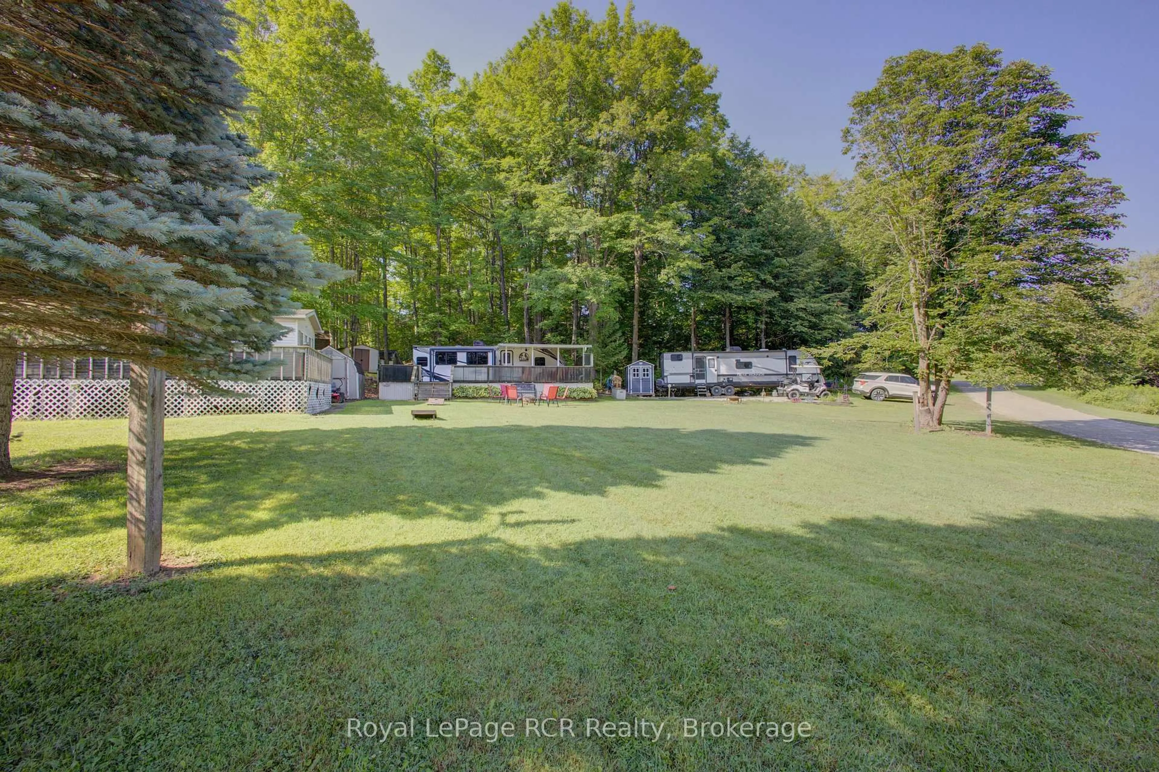 A pic from outside/outdoor area/front of a property/back of a property/a pic from drone, forest/trees view for 142571 35 Rd #Site 119, West Grey Ontario N0G 1C0