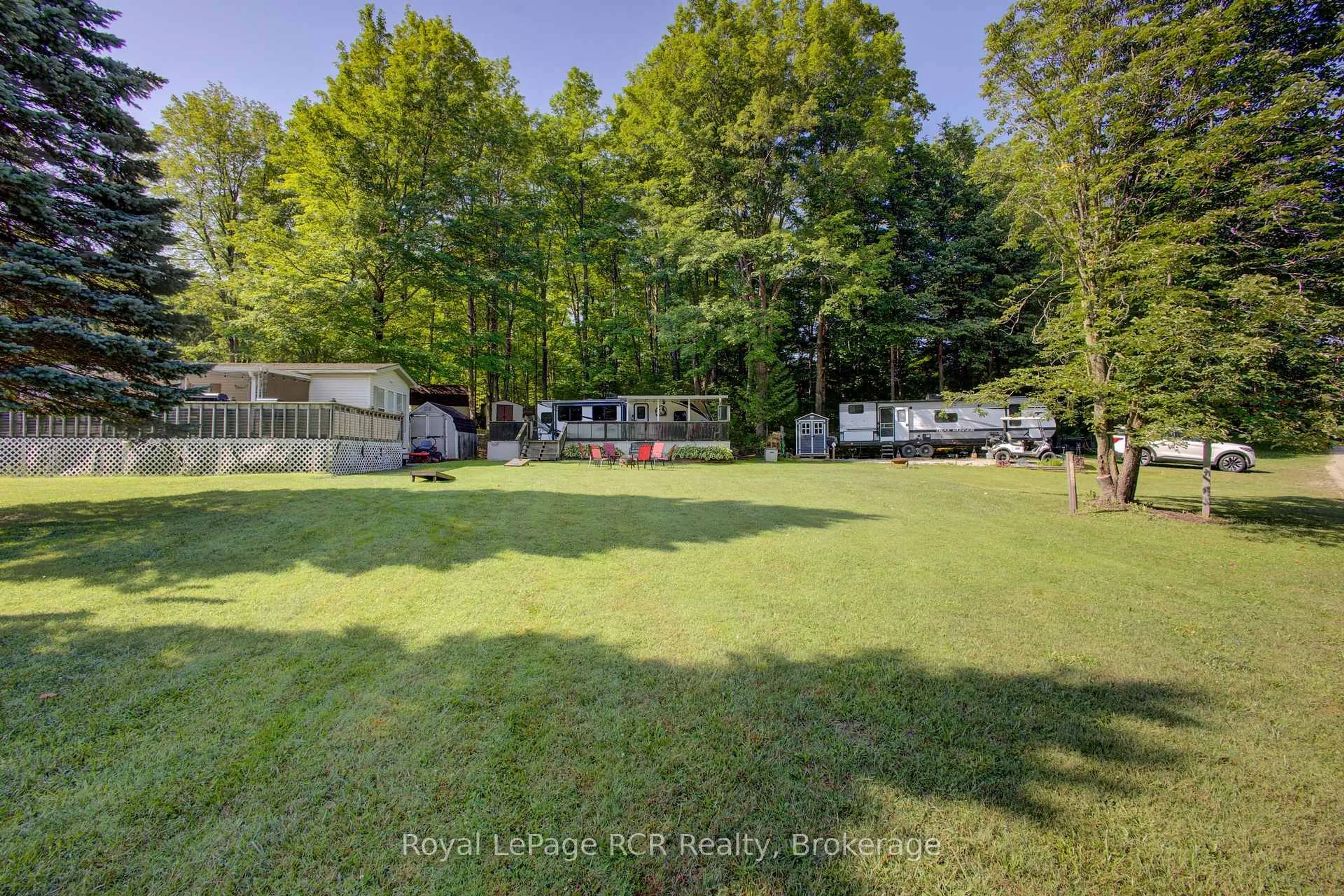 A pic from outside/outdoor area/front of a property/back of a property/a pic from drone, forest/trees view for 142571 35 Rd #Site 119, West Grey Ontario N0G 1C0