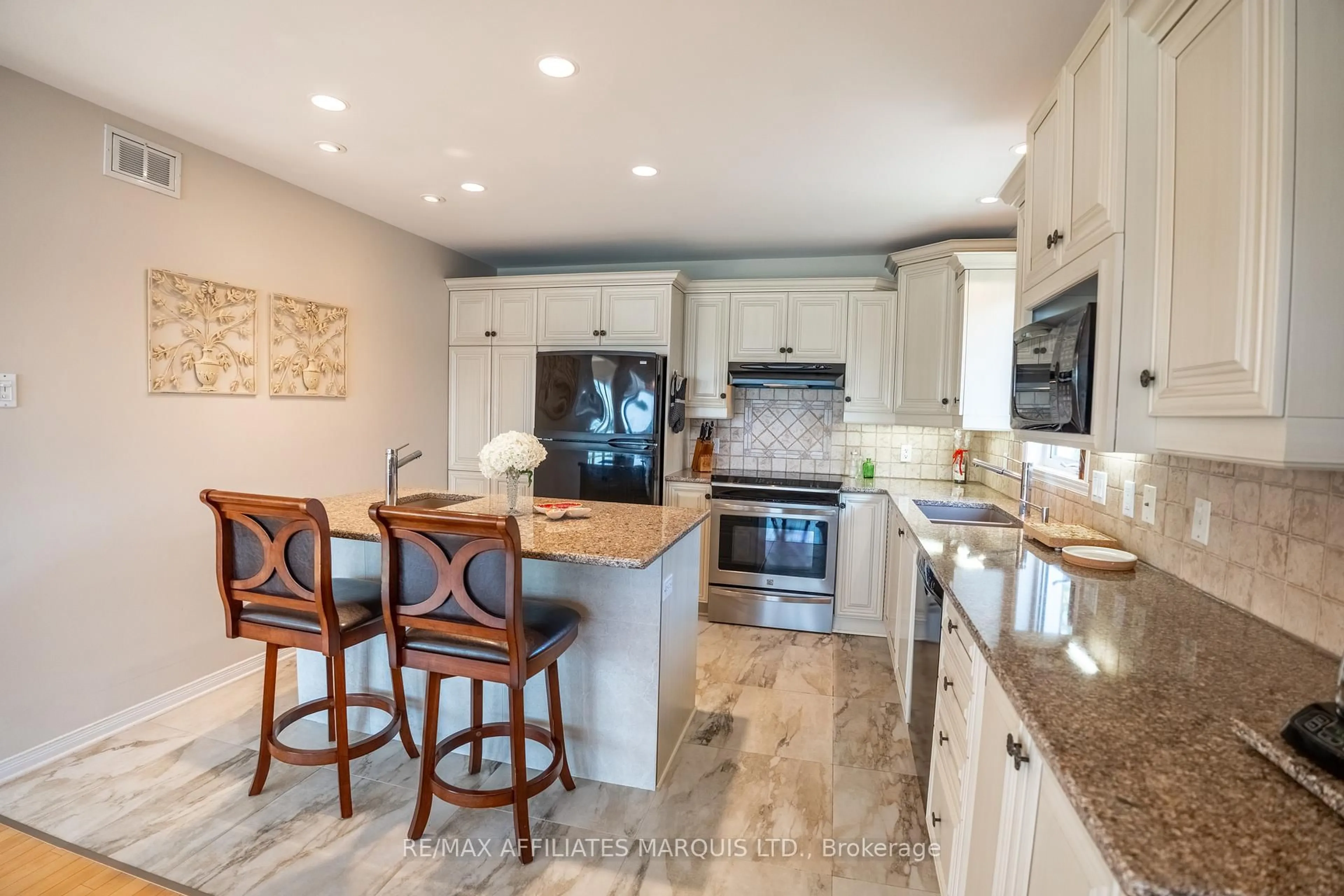 Open concept kitchen, ceramic/tile floor for 1172 Kirkman Crt, Cornwall Ontario K6H 5E2