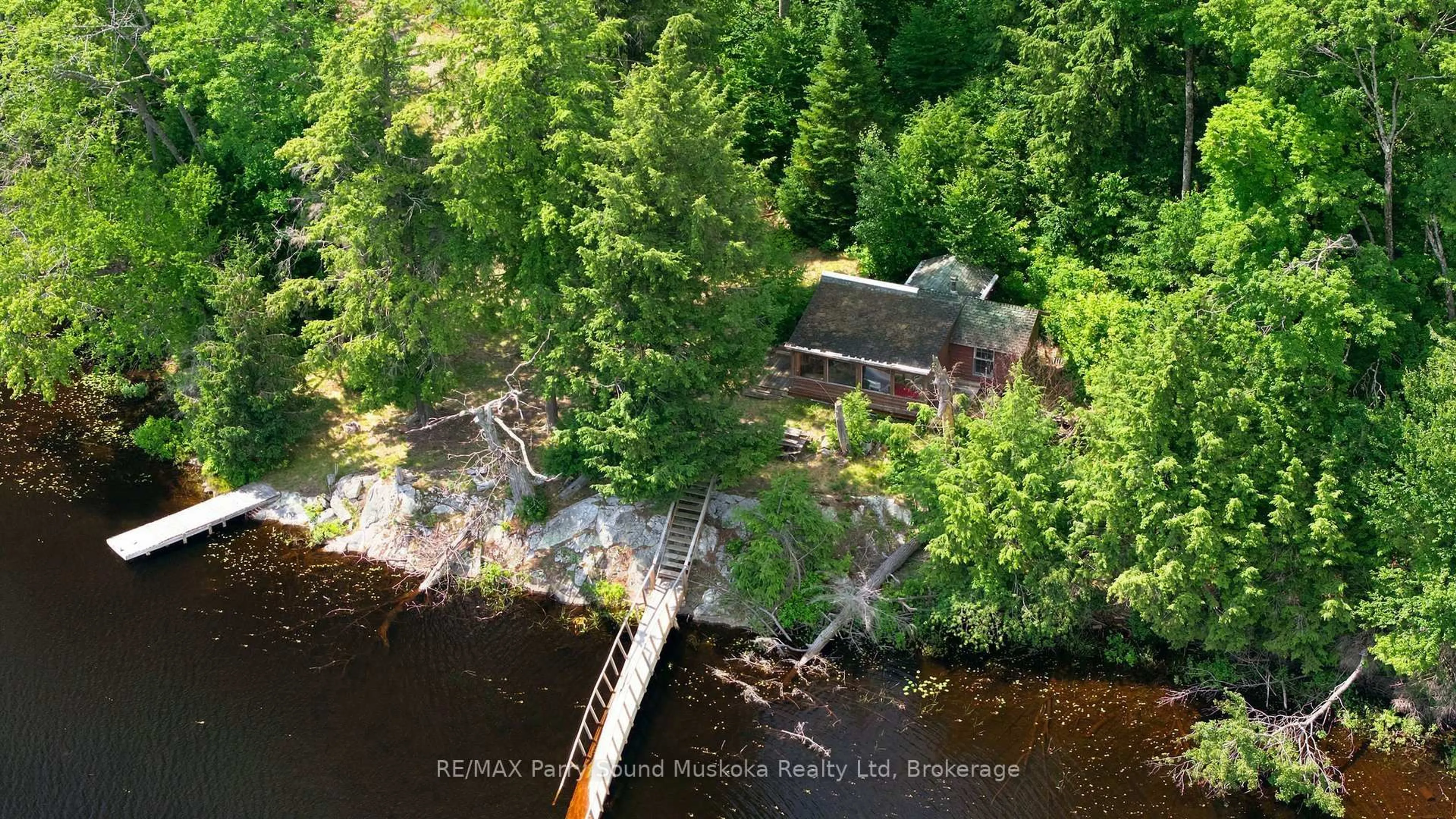 A pic from outside/outdoor area/front of a property/back of a property/a pic from drone, water/lake/river/ocean view for 24 South Crane Lake Rd, The Archipelago Ontario P2A 0B7