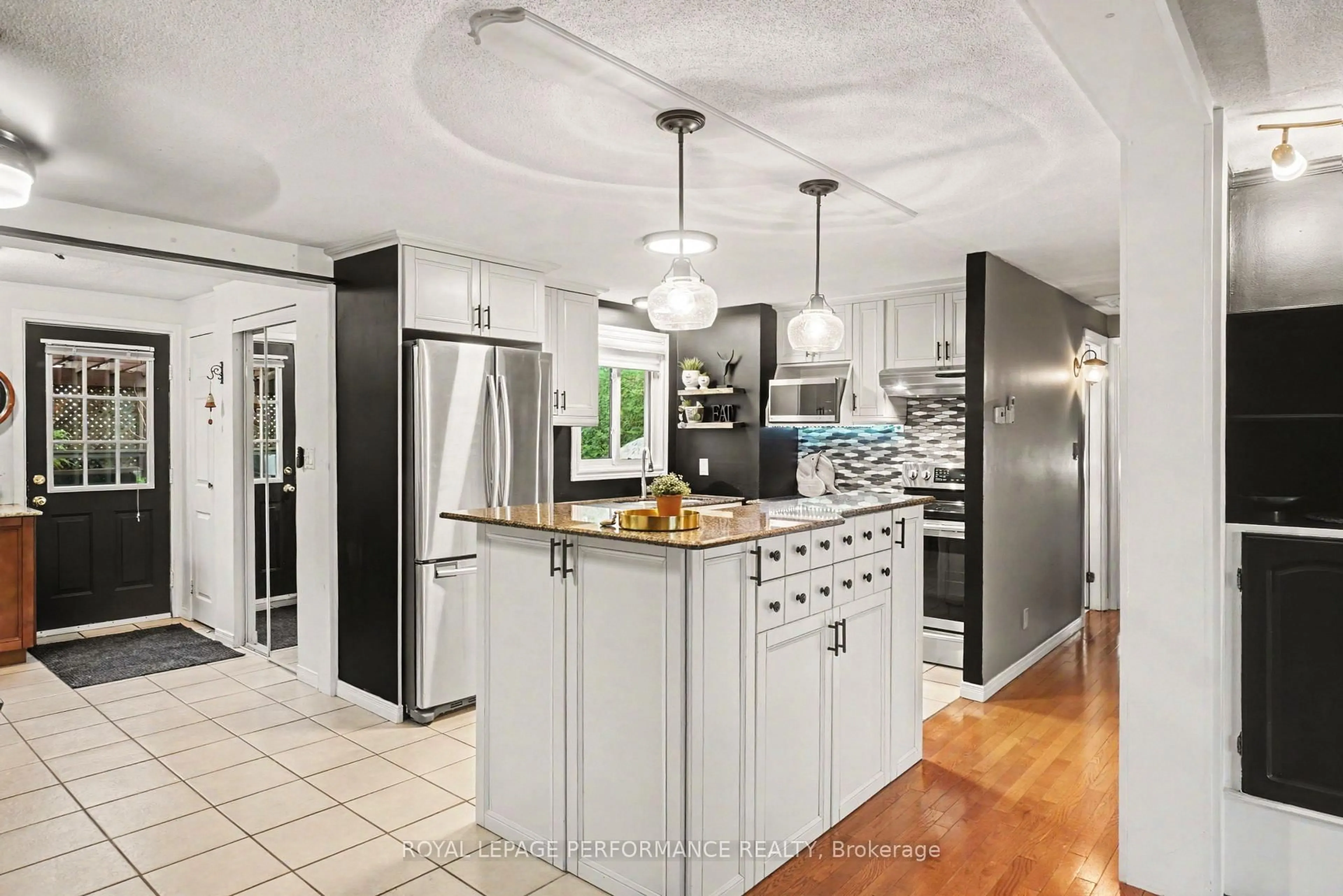 Open concept kitchen, ceramic/tile floor for 1497 Blackheath St, Orleans Ontario K1E 1K6