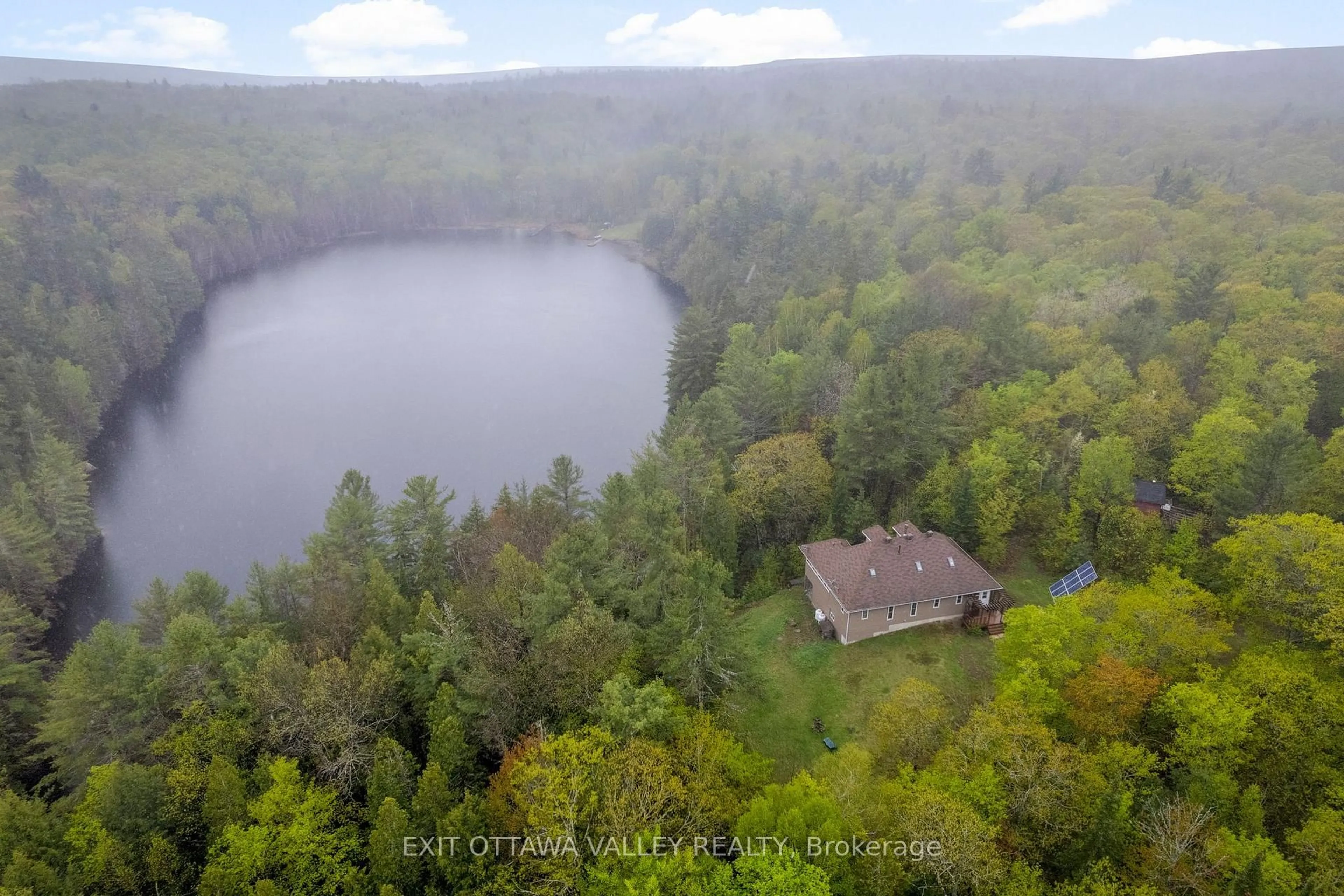A pic from outside/outdoor area/front of a property/back of a property/a pic from drone, water/lake/river/ocean view for 28084 Highway 41, Dacre Ontario K0J 1N0