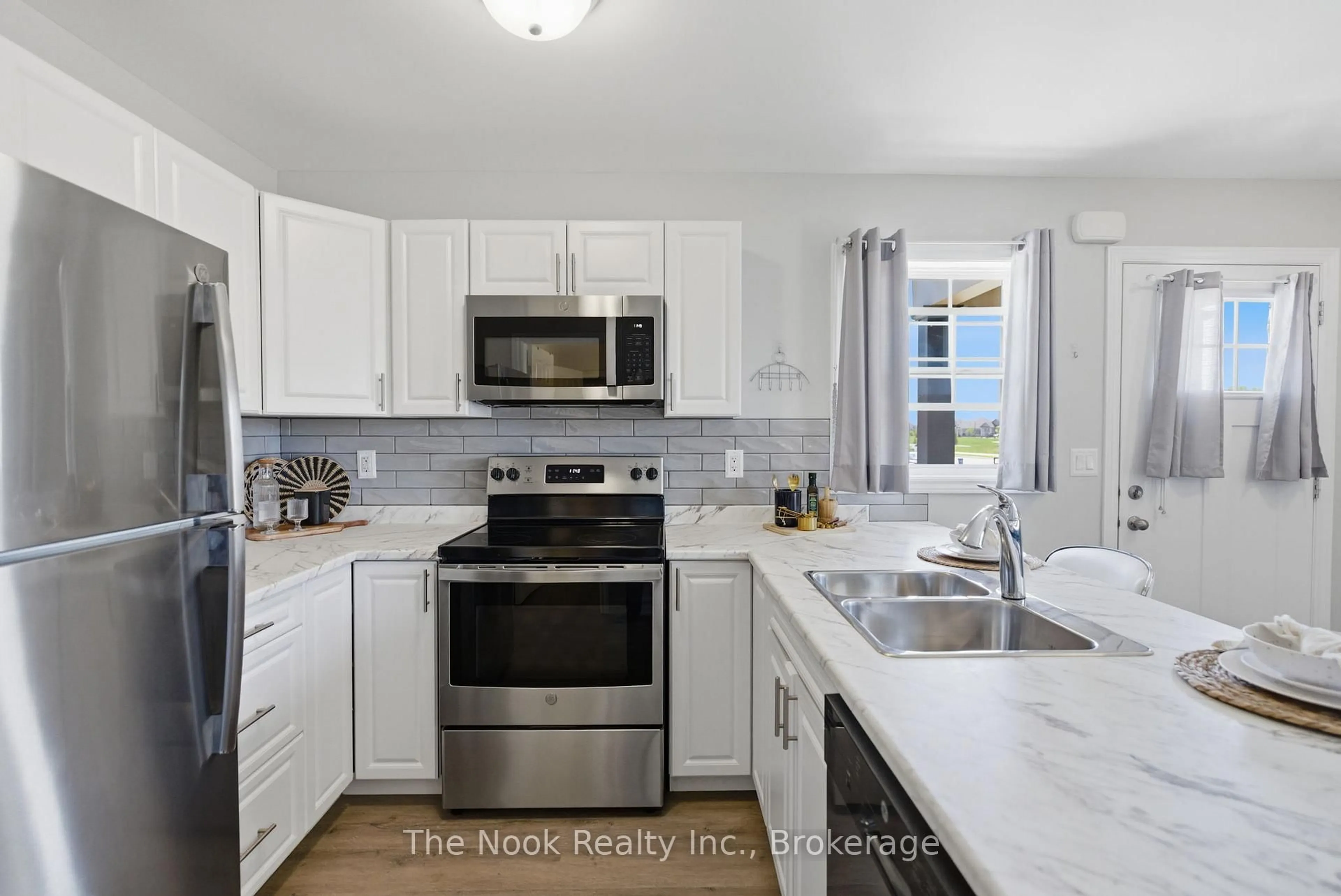 Open concept kitchen, unknown for 470 Lonsberry Dr #506, Cobourg Ontario K9A 0K4