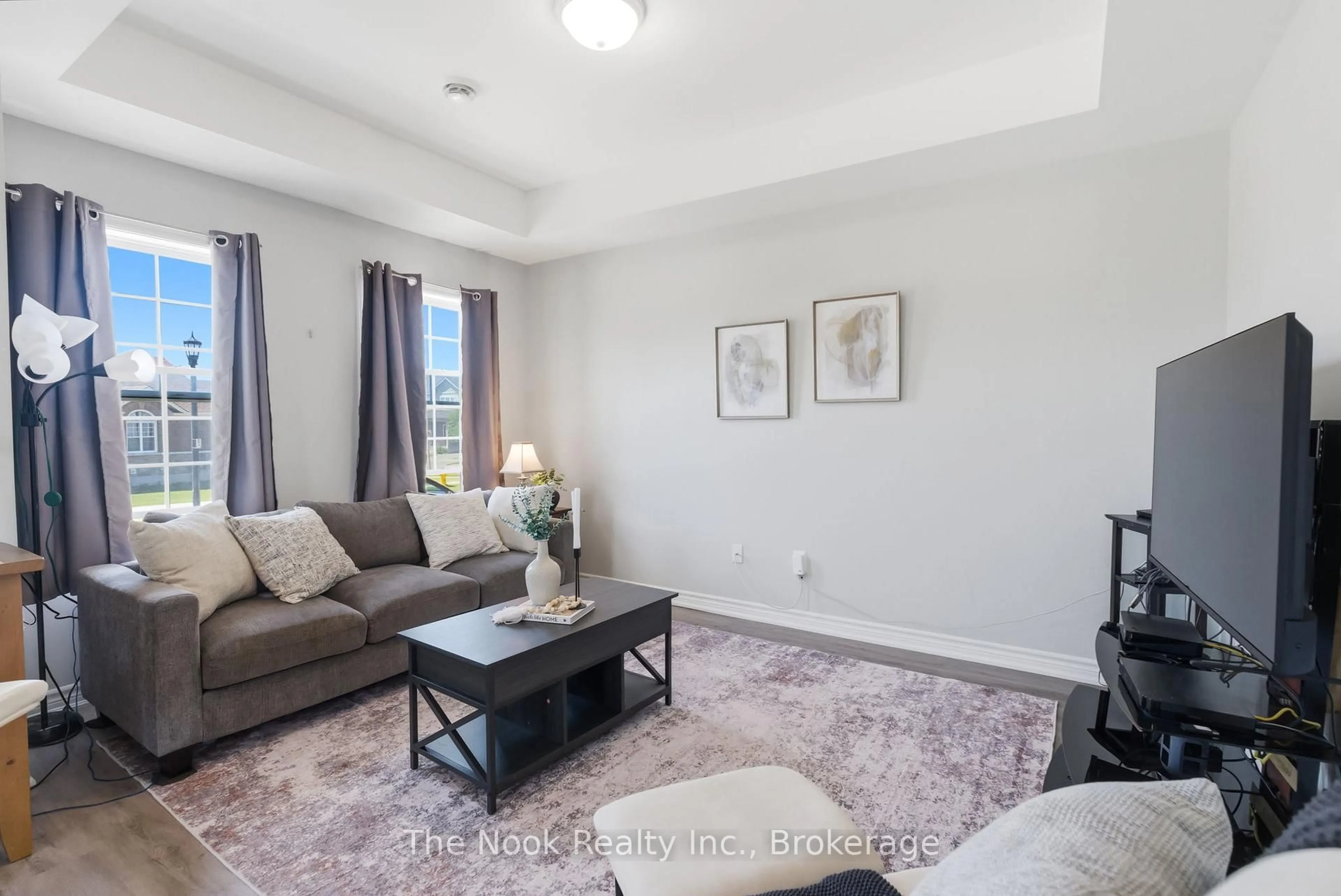Living room with furniture, carpet floor for 470 Lonsberry Dr #506, Cobourg Ontario K9A 0K4