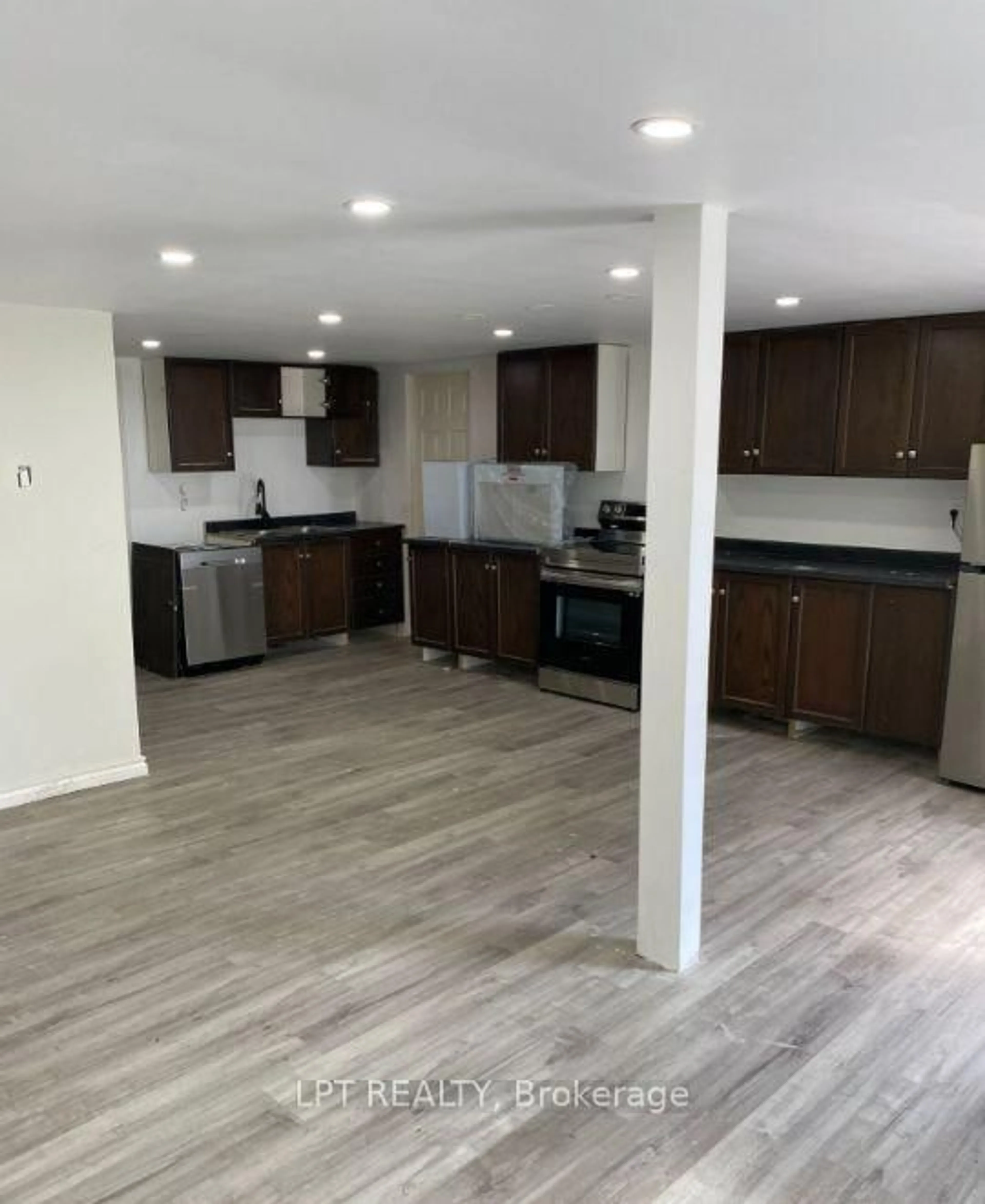 Open concept kitchen, wood/laminate floor for 28 Derner Line, Haldimand Ontario N0A 1K0