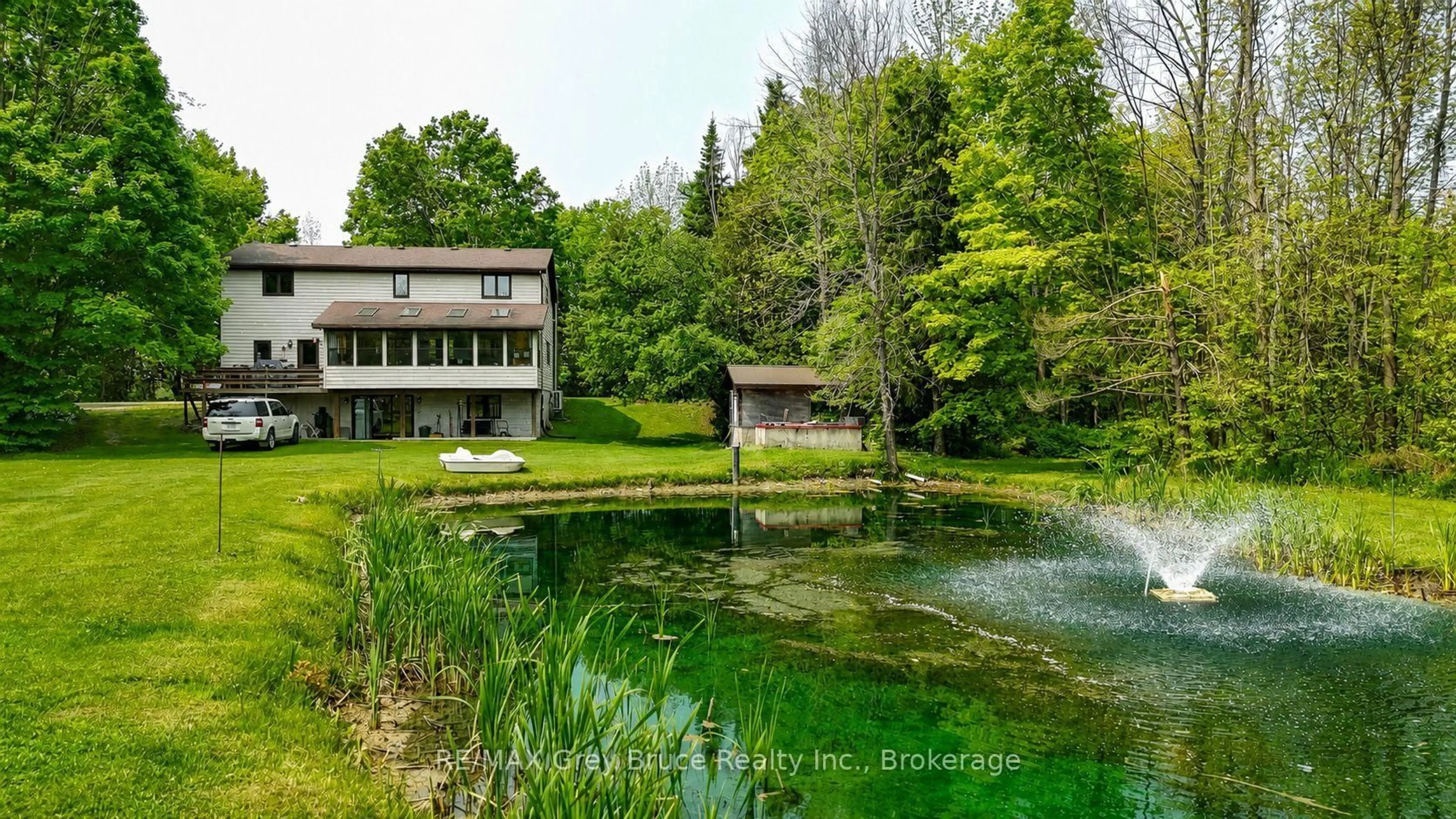 A pic from outside/outdoor area/front of a property/back of a property/a pic from drone, water/lake/river/ocean view for 1033 Bruce Road 9, South Bruce Peninsula Ontario N0H 2T0