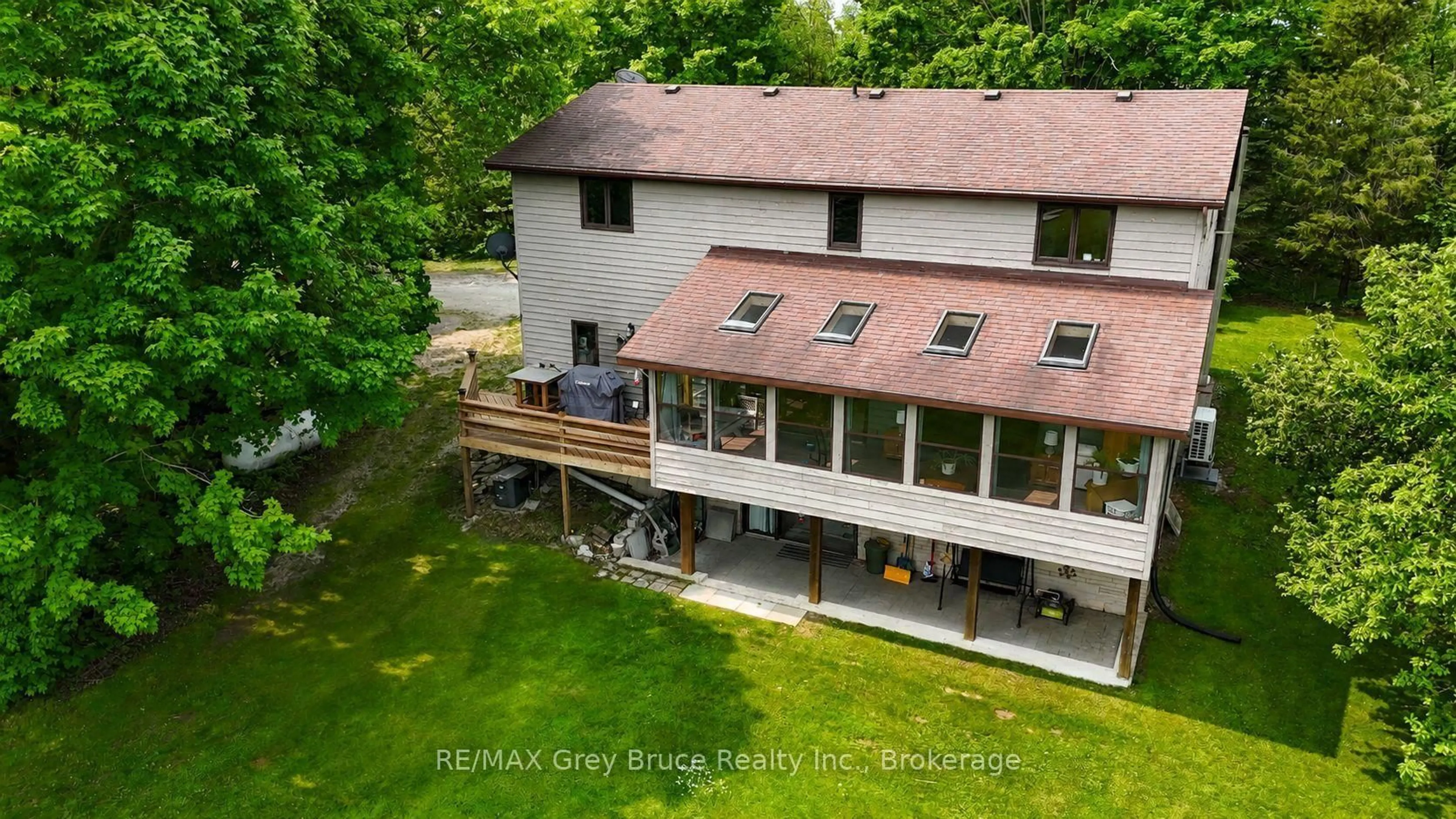 A pic from outside/outdoor area/front of a property/back of a property/a pic from drone, unknown for 1033 Bruce Road 9, South Bruce Peninsula Ontario N0H 2T0