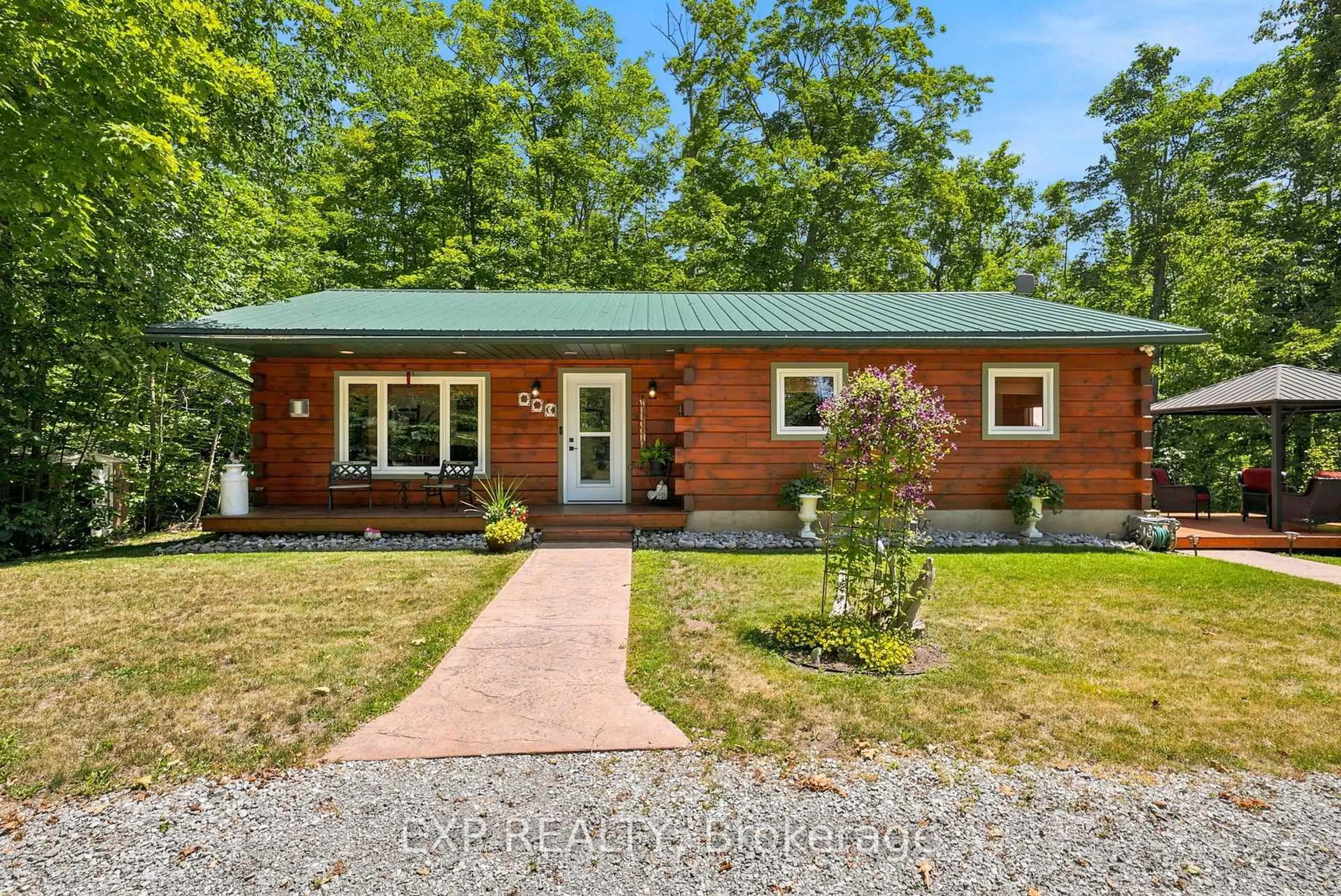 Home with brick exterior material, unknown for 944 County Road 8 Rd, Kawartha Lakes Ontario K0M 1N0