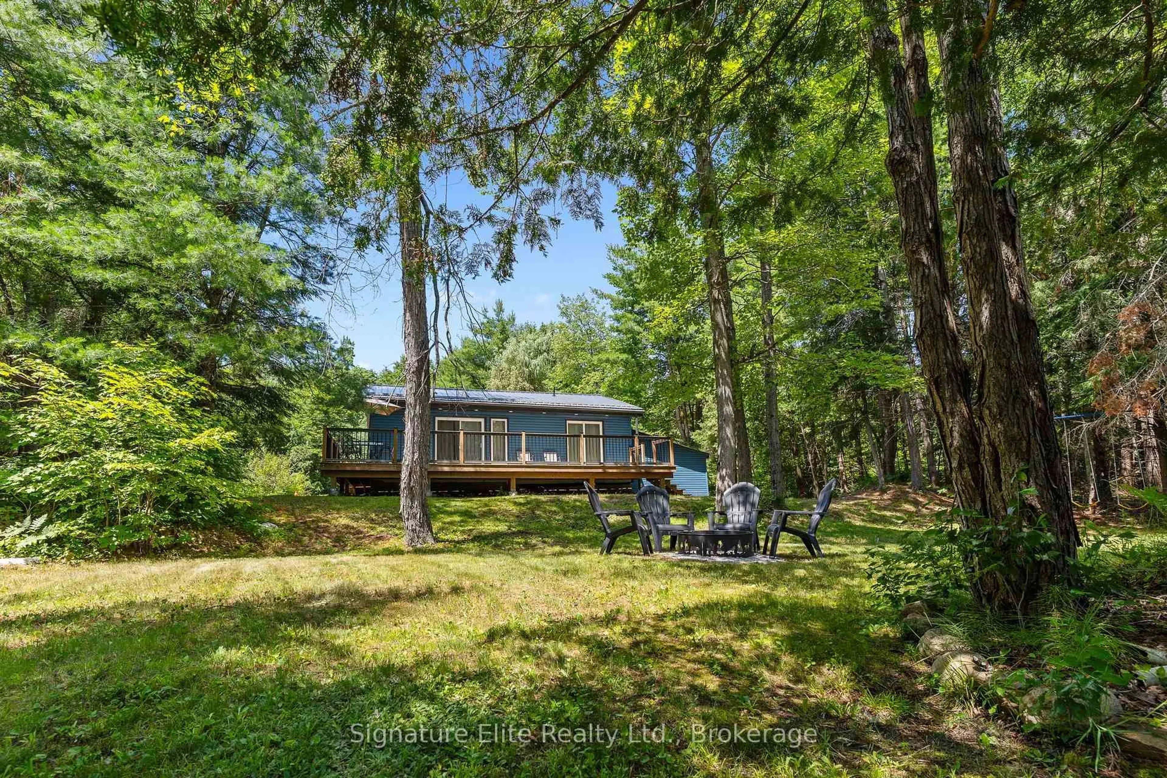 A pic from outside/outdoor area/front of a property/back of a property/a pic from drone, forest/trees view for 86 Boyce Tr, Kawartha Lakes Ontario K0M 2L0