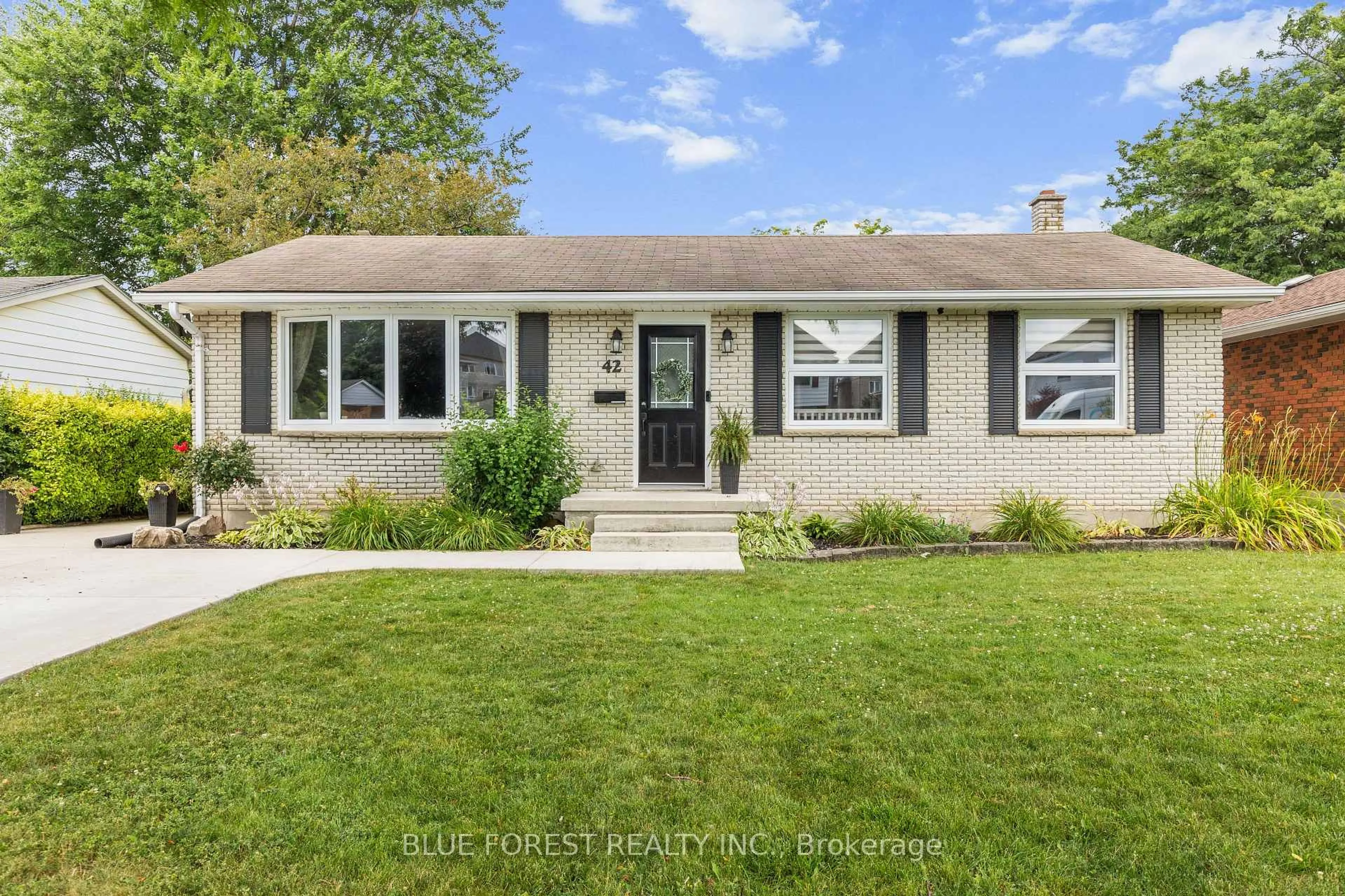 Home with vinyl exterior material, street for 42 Dunwich Dr, St. Thomas Ontario N5R 4T9