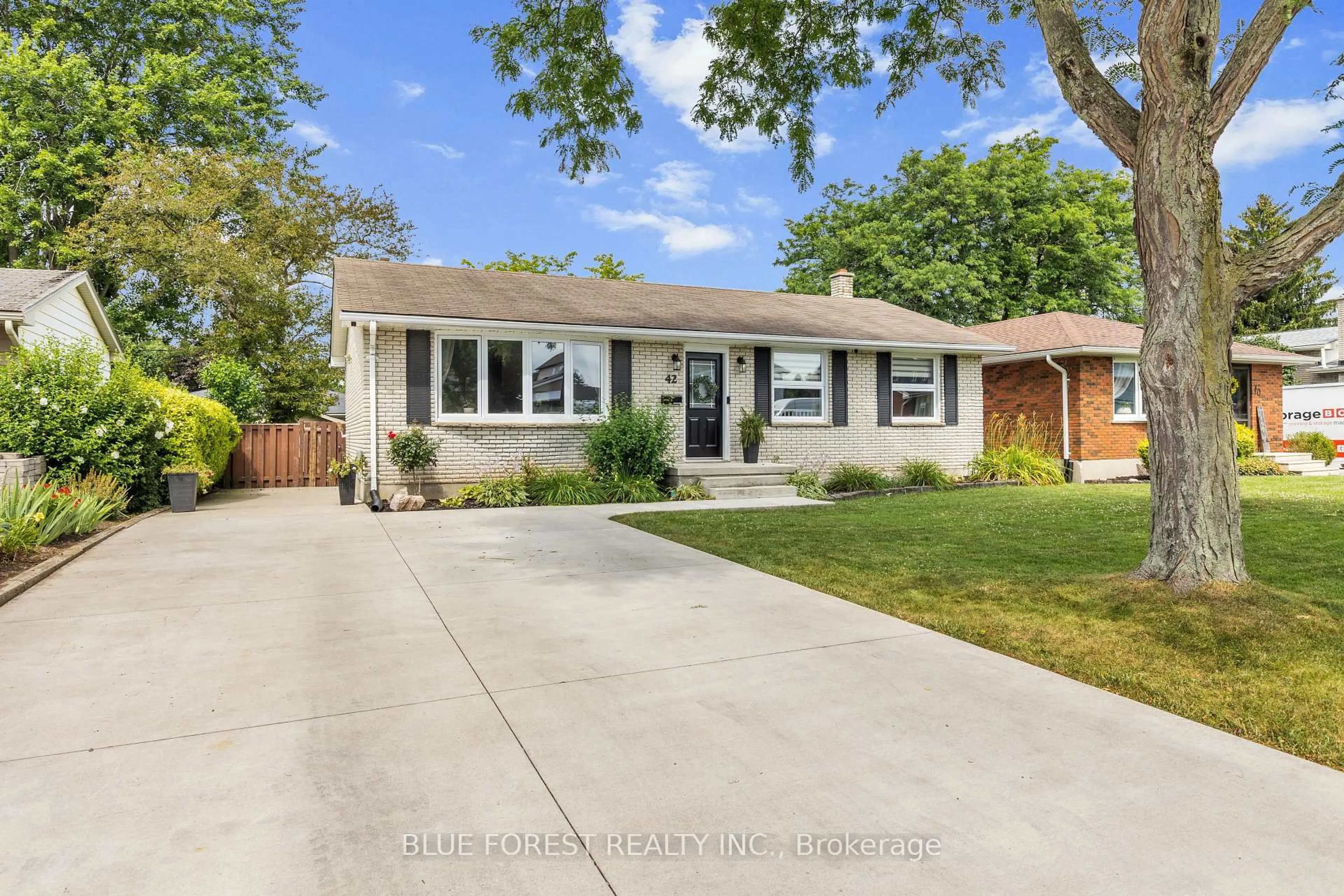 Home with vinyl exterior material, street for 42 Dunwich Dr, St. Thomas Ontario N5R 4T9