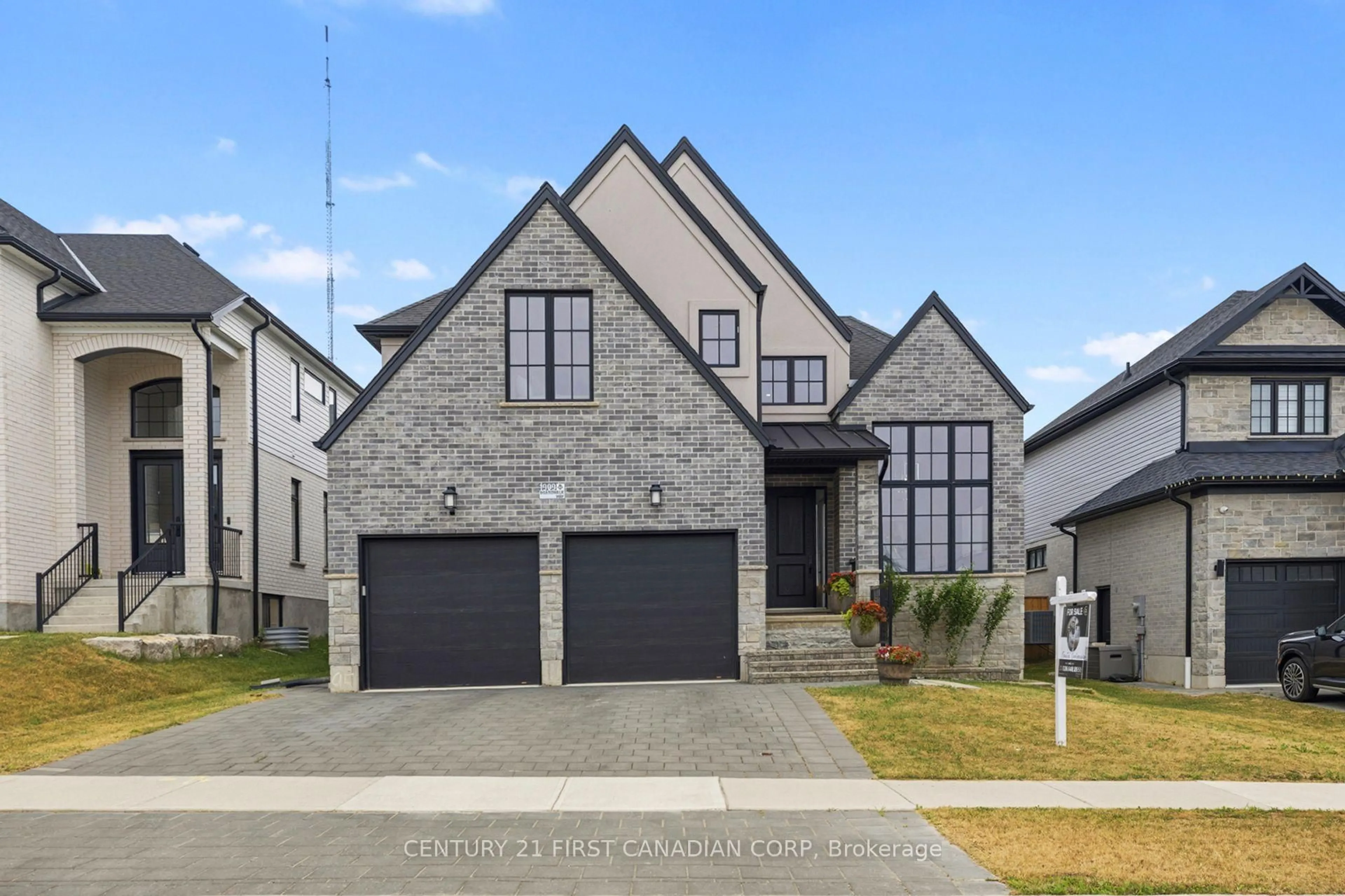 Home with brick exterior material, street for 1909 Boardwalk Way, London South Ontario N6K 0J3