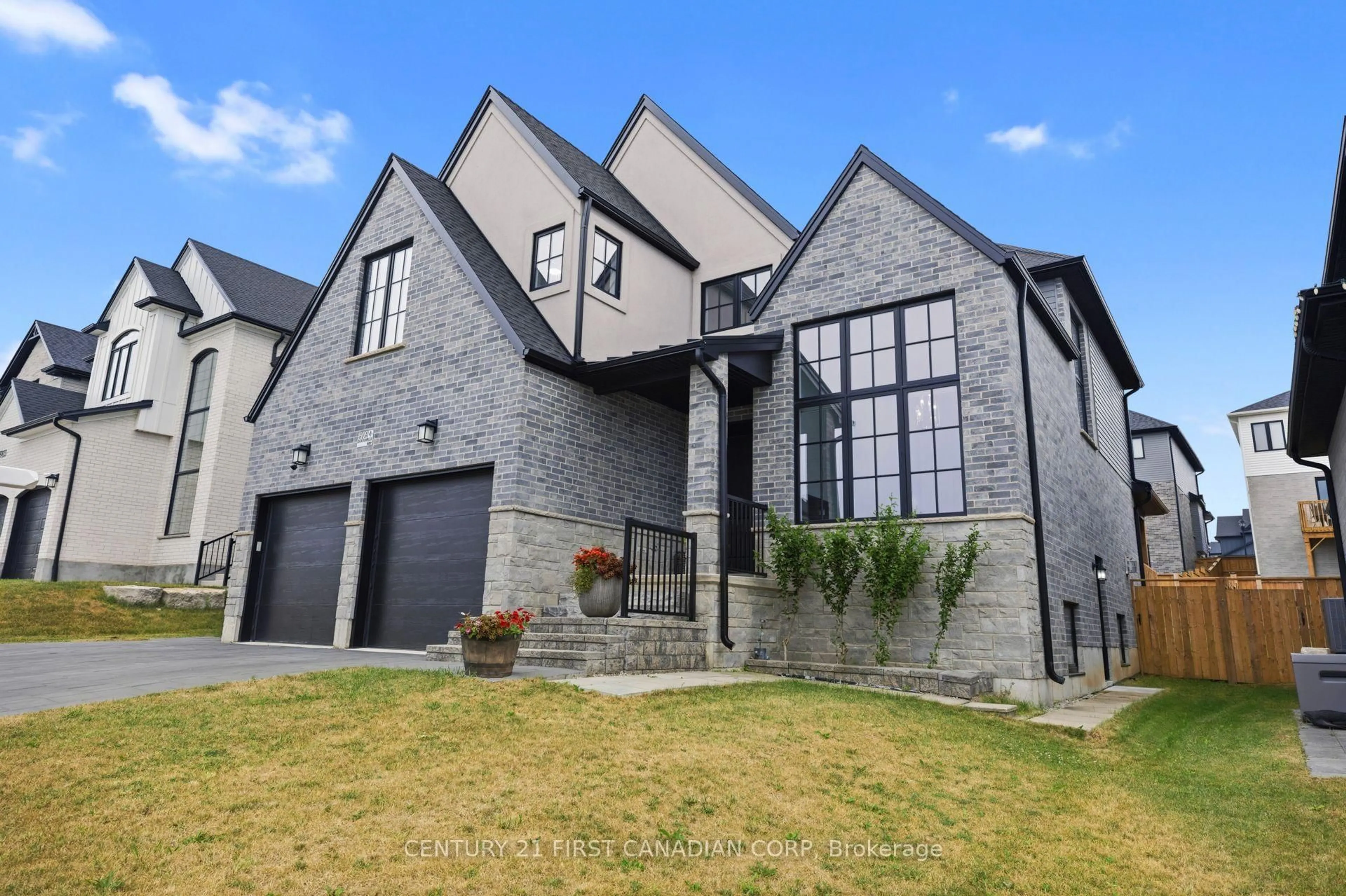 Home with brick exterior material, street for 1909 Boardwalk Way, London South Ontario N6K 0J3