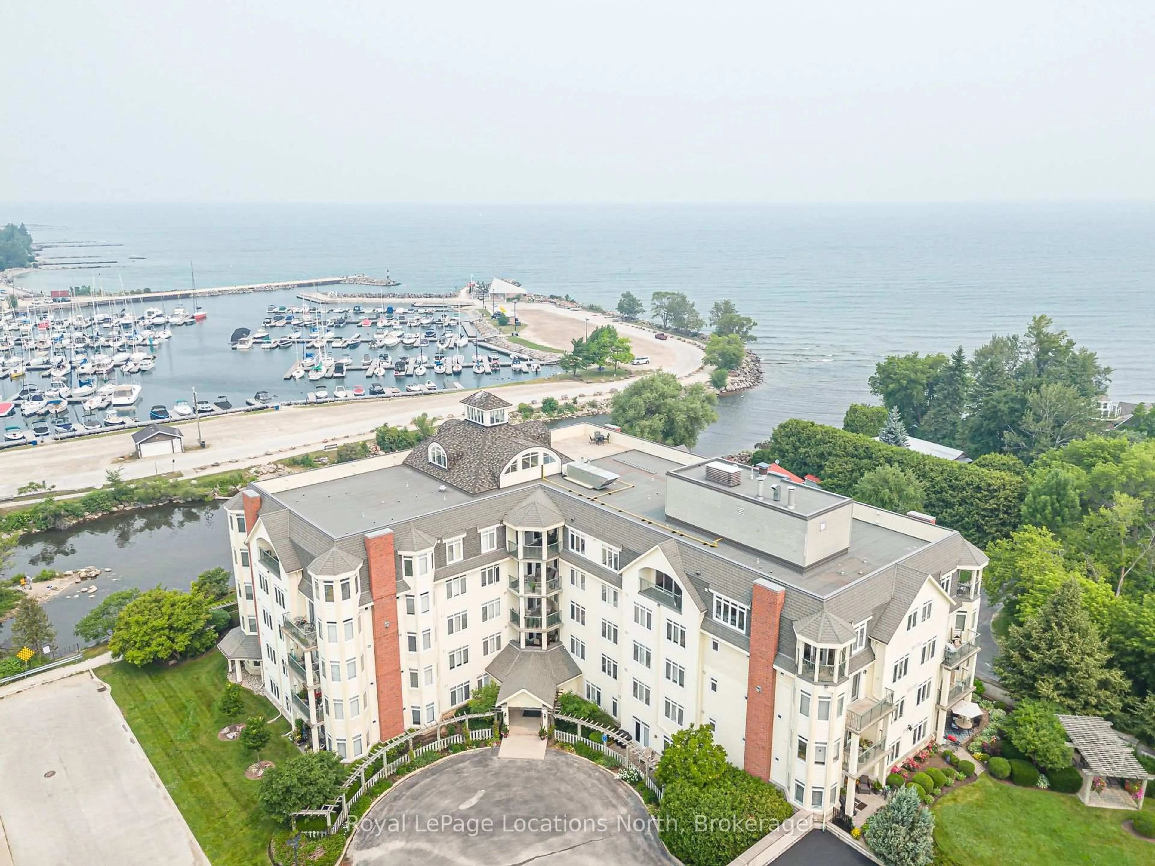 A pic from outside/outdoor area/front of a property/back of a property/a pic from drone, water/lake/river/ocean view for 10 Bay St #103, Blue Mountains Ontario N0H 2P0