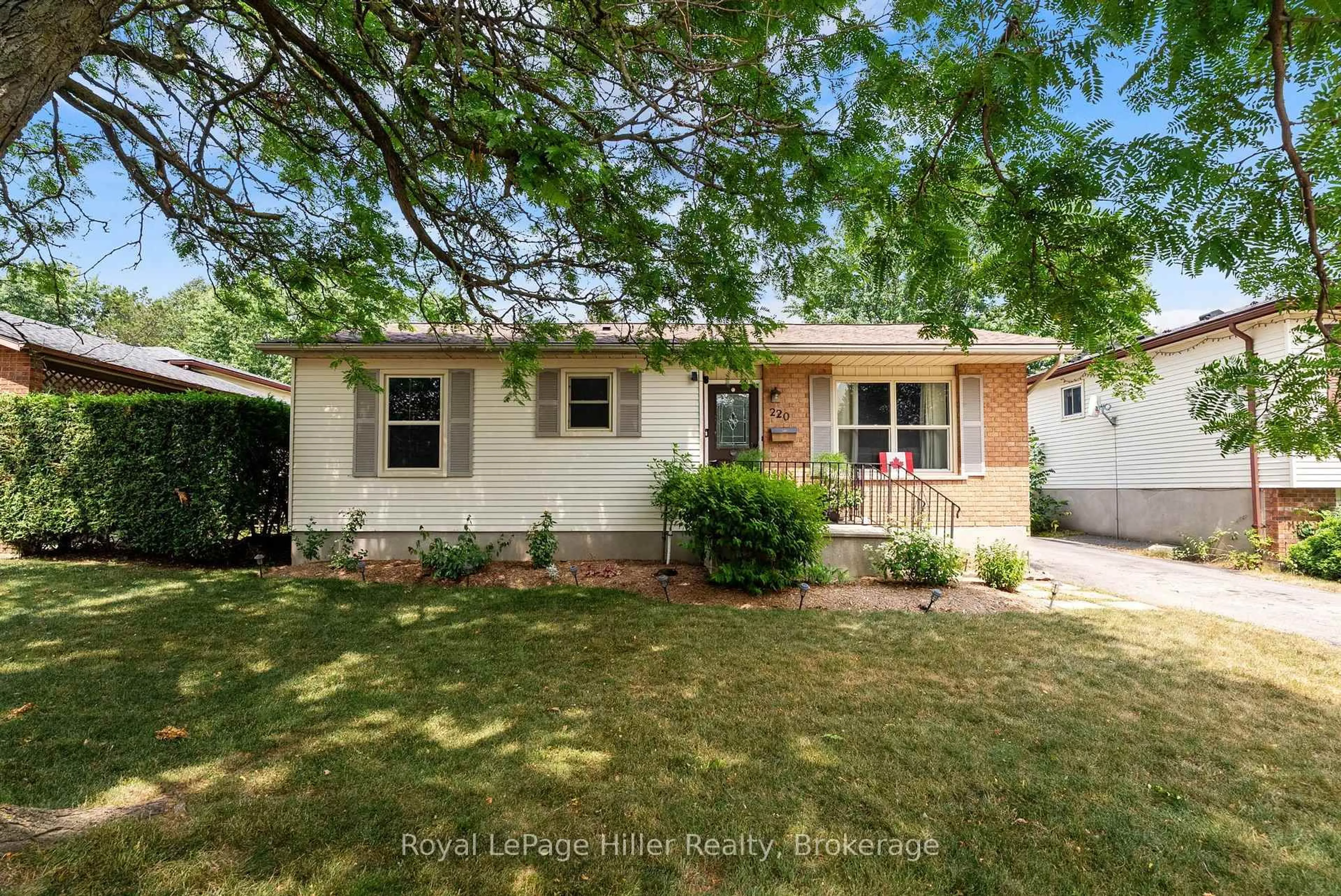 Home with vinyl exterior material, street for 220 Greenwood Dr, Stratford Ontario N5A 7M9