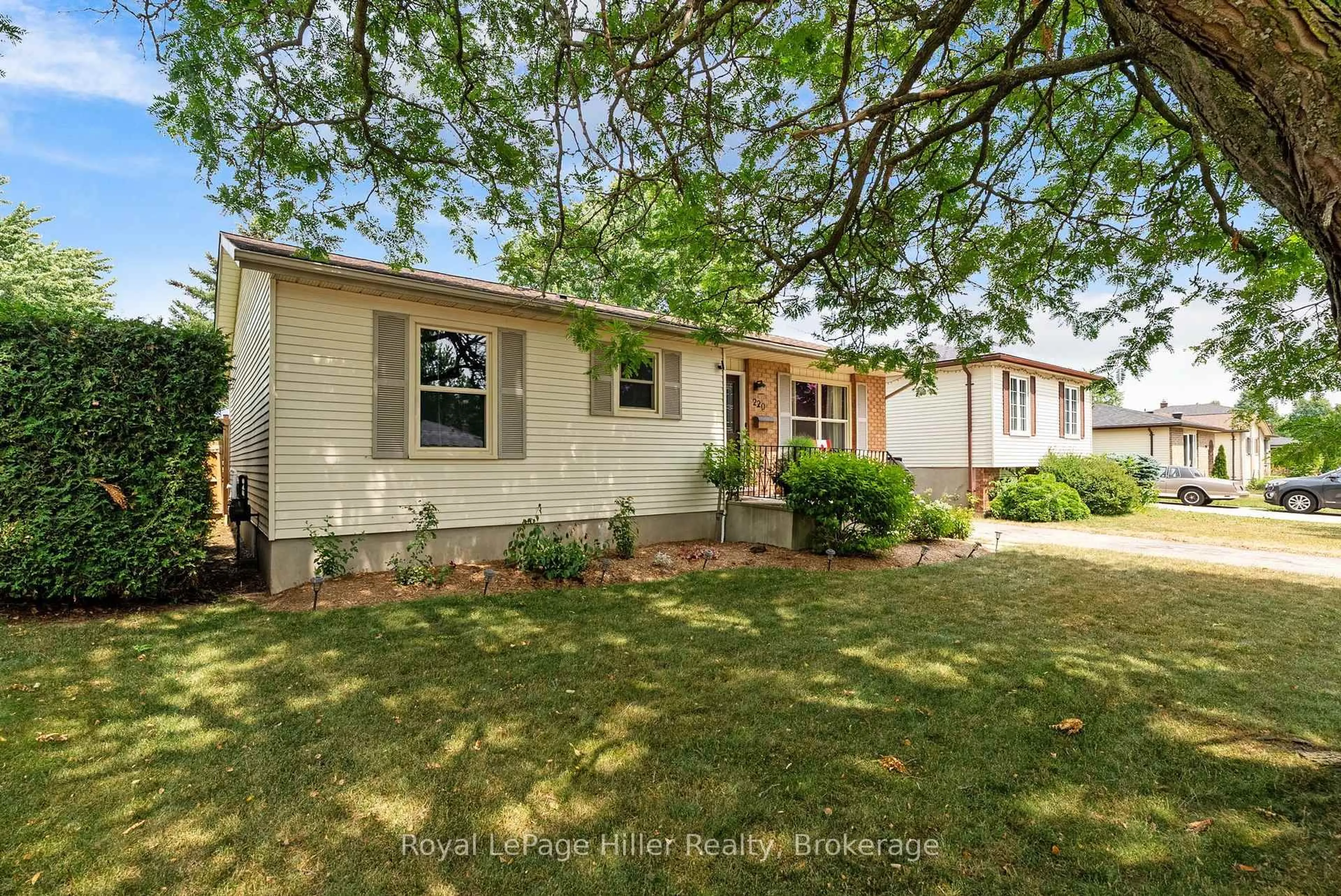 Home with vinyl exterior material, street for 220 Greenwood Dr, Stratford Ontario N5A 7M9