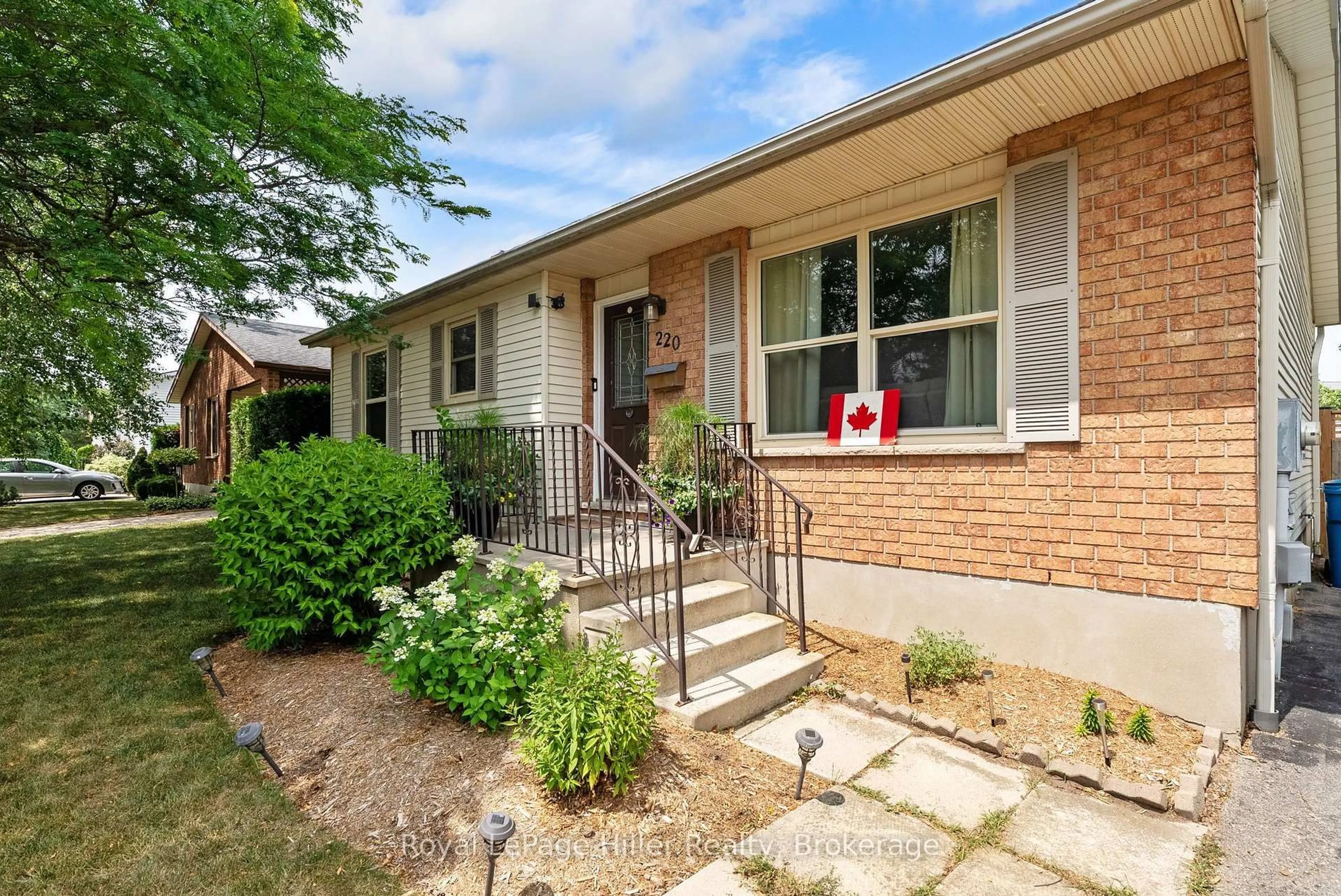 Home with brick exterior material, street for 220 Greenwood Dr, Stratford Ontario N5A 7M9