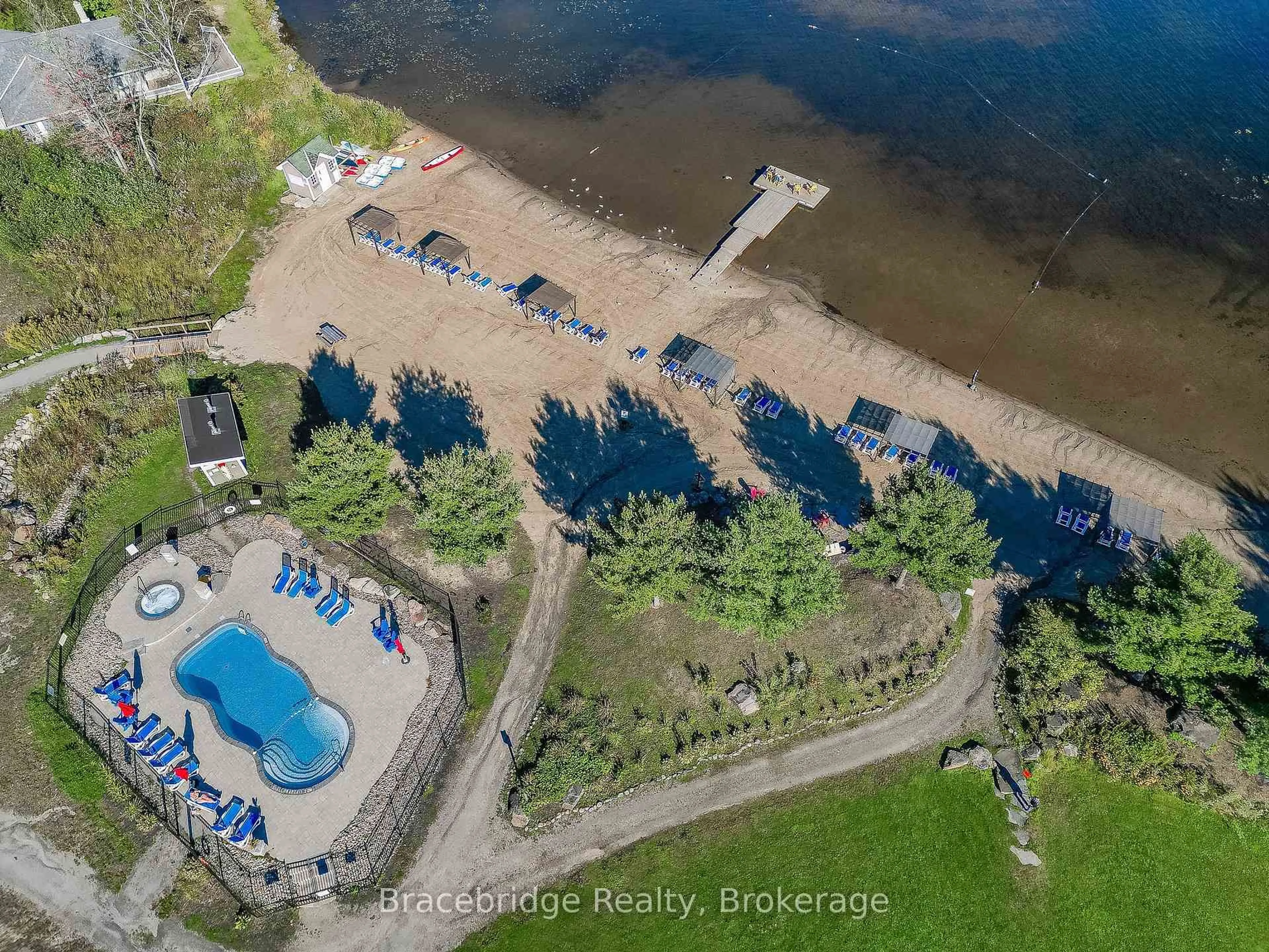 A pic from outside/outdoor area/front of a property/back of a property/a pic from drone, water/lake/river/ocean view for 1869 Muskoka Rd 118 Highway #L209-C1, Muskoka Lakes Ontario P1L 1W8