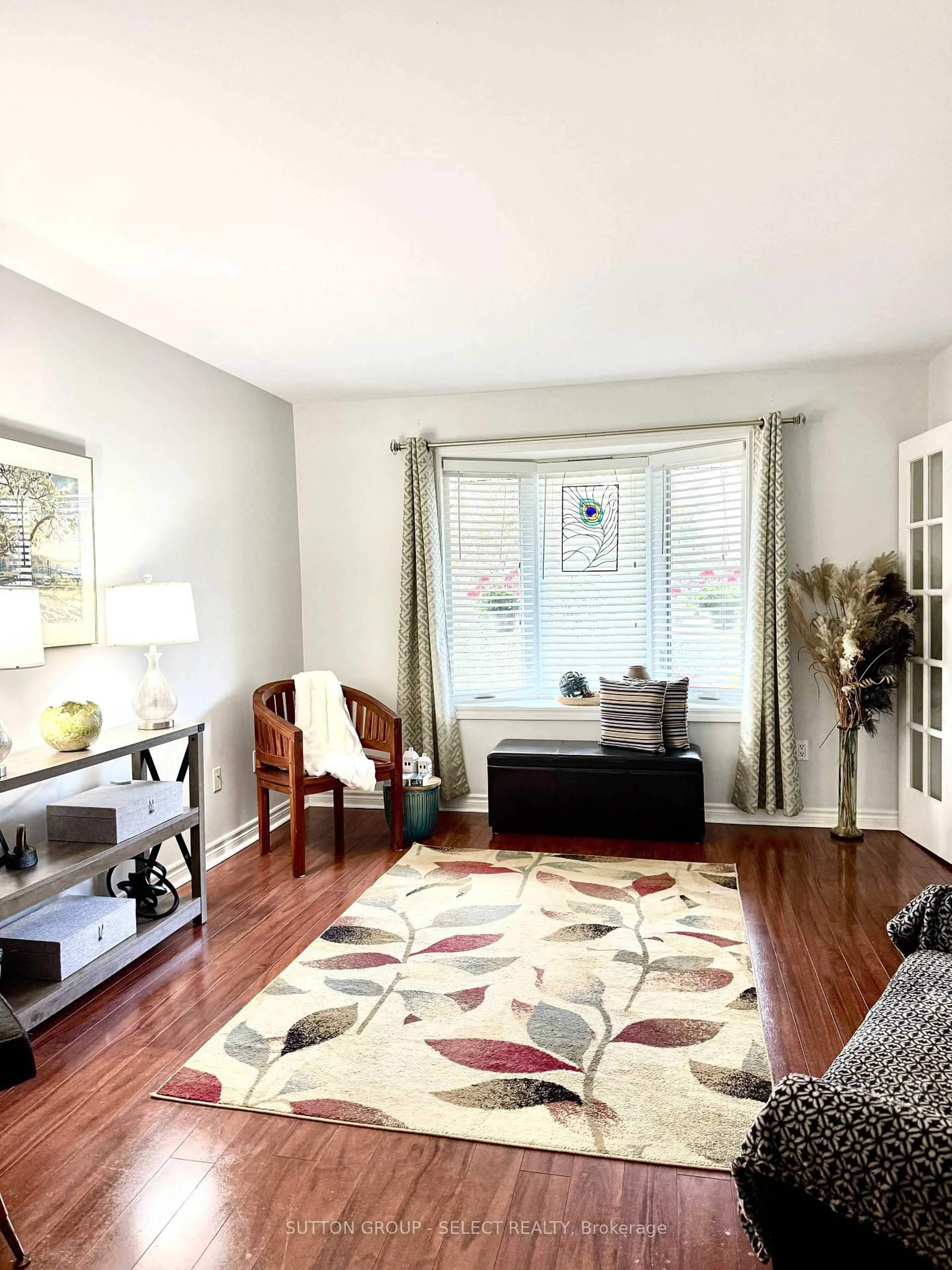 Living room with furniture, wood/laminate floor for 97 Tiner Ave, Thames Centre Ontario N0L 1G2
