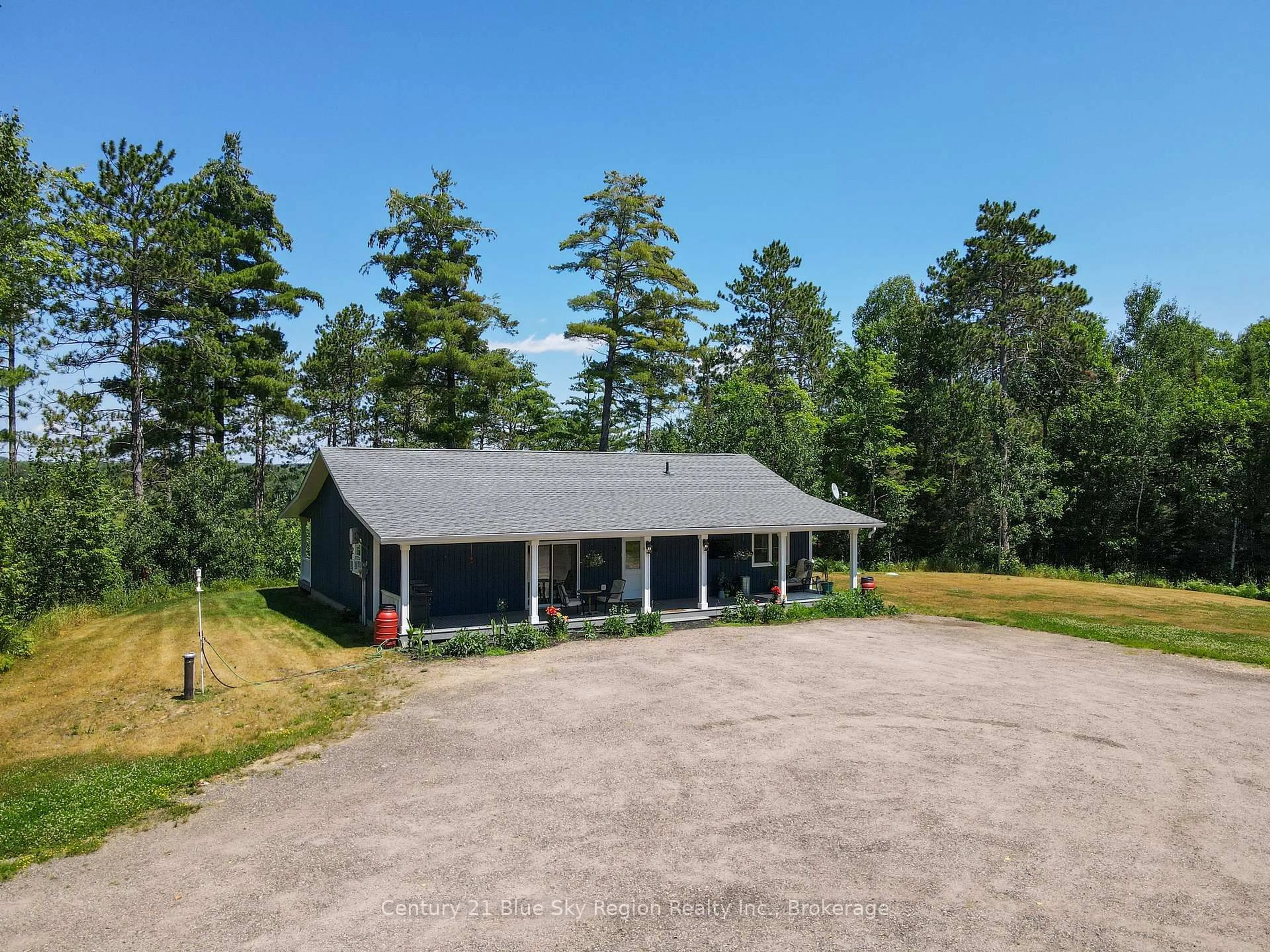 A pic from outside/outdoor area/front of a property/back of a property/a pic from drone, unknown for 649 Hazel Glen Rd, Callander Ontario P0H 1H0