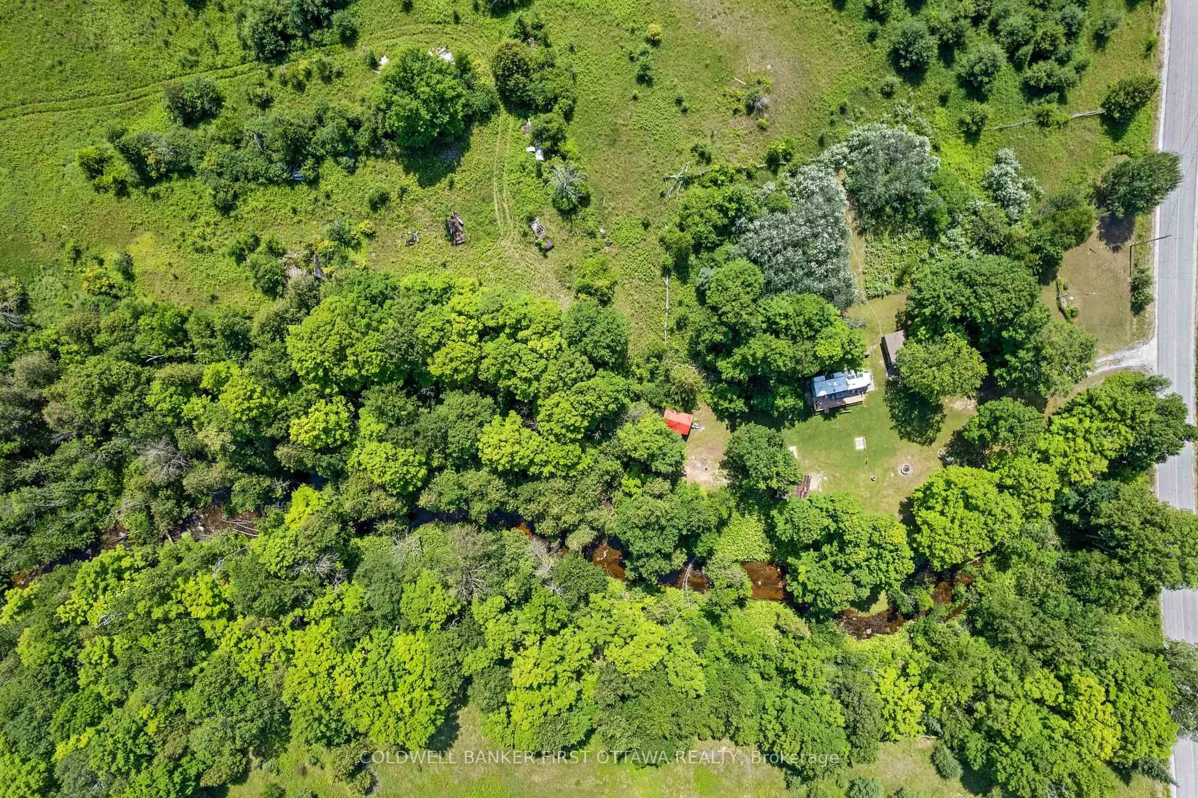 A pic from outside/outdoor area/front of a property/back of a property/a pic from drone, forest/trees view for 294 Lavant Mill Rd, Mcdonalds Corners Ontario K0G 1M0