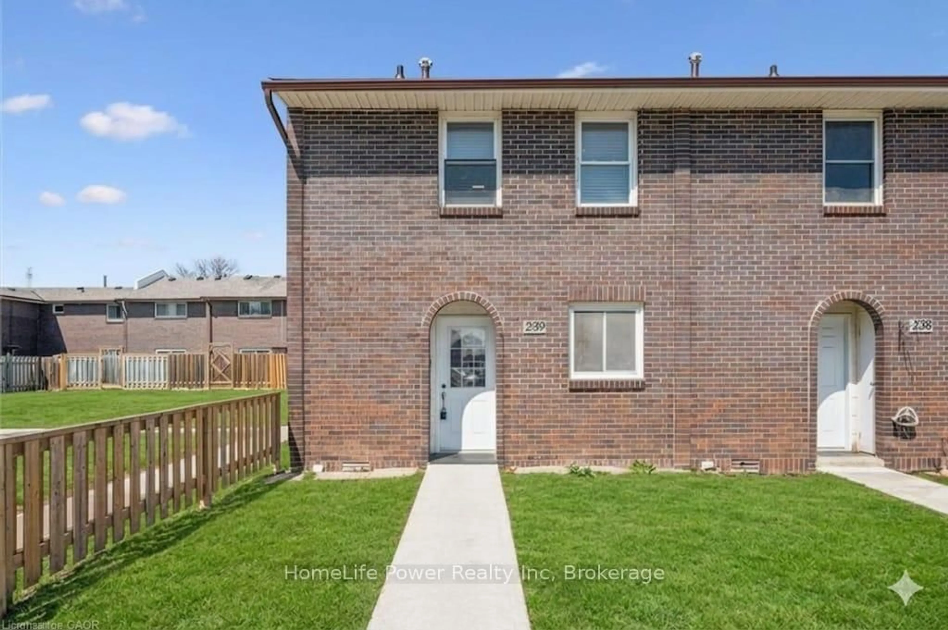 Home with brick exterior material, street for 31 Greengate Rd #239, Guelph Ontario N1H 6R3