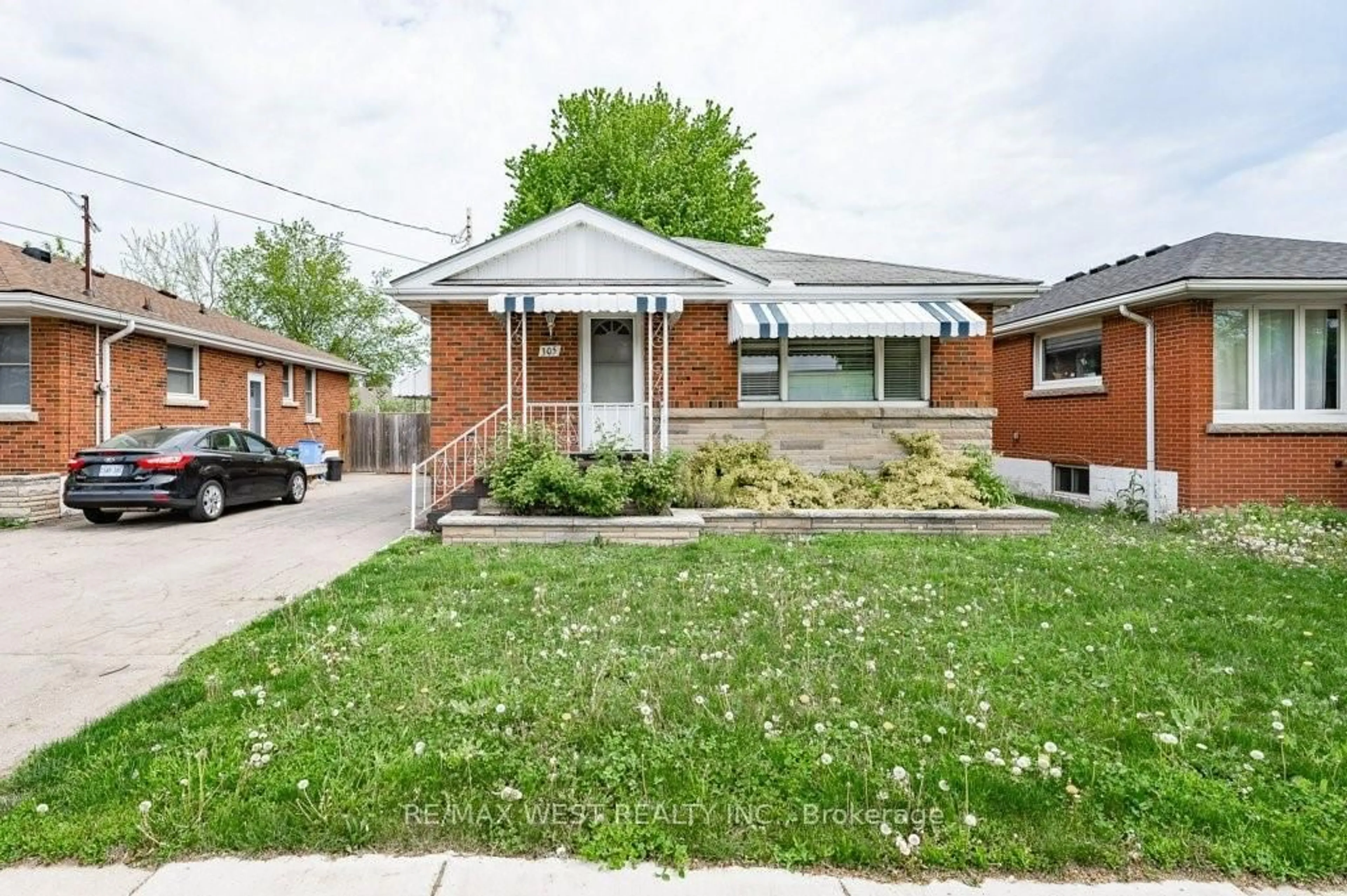 Home with brick exterior material, street for 305 Mohawk Rd, Hamilton Ontario L9A 2J5